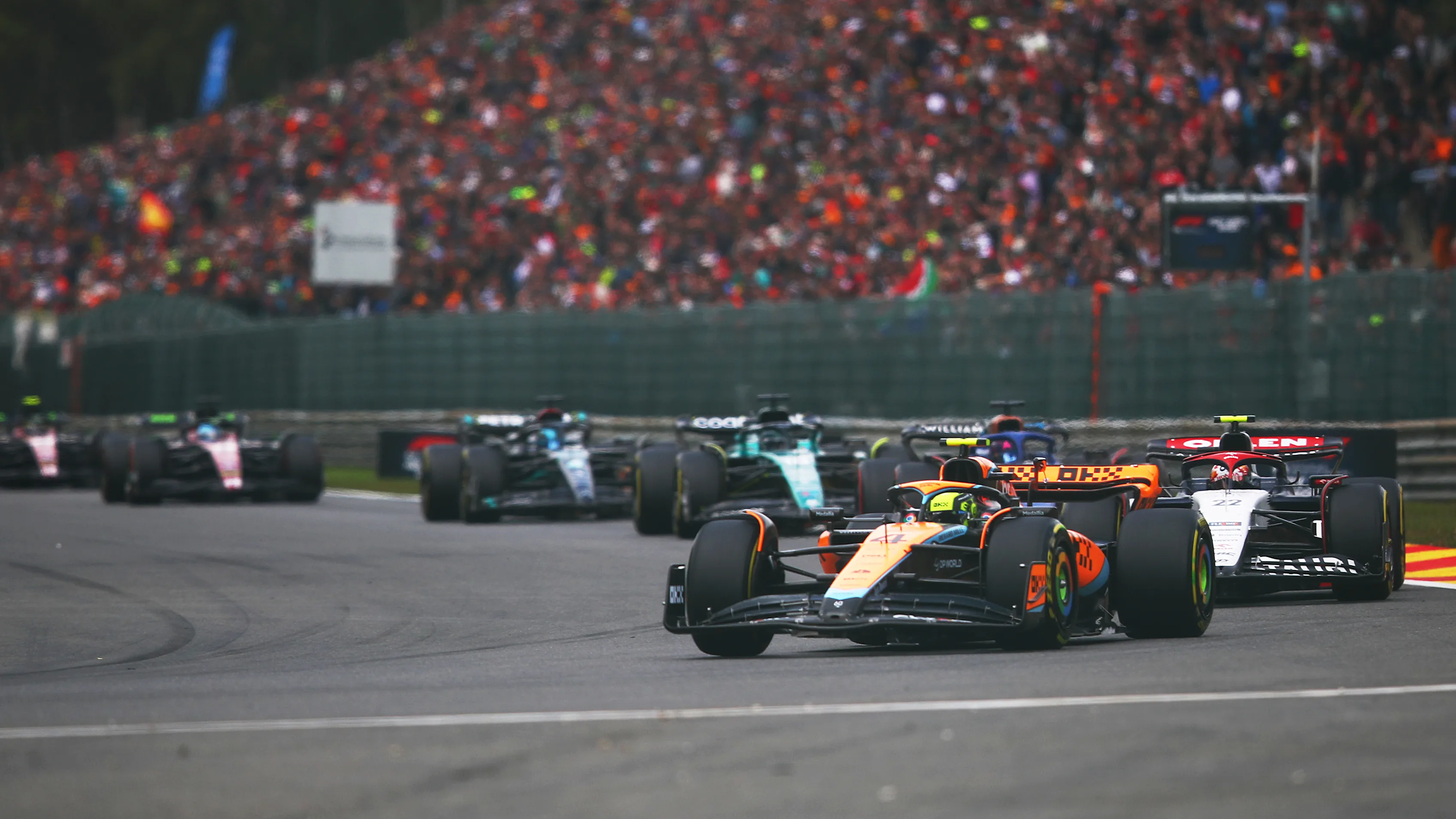 SPA, BELGIUM - JULY 30: Lance Stroll of Canada driving the (18) Aston Martin AMR23 Mercedes leads