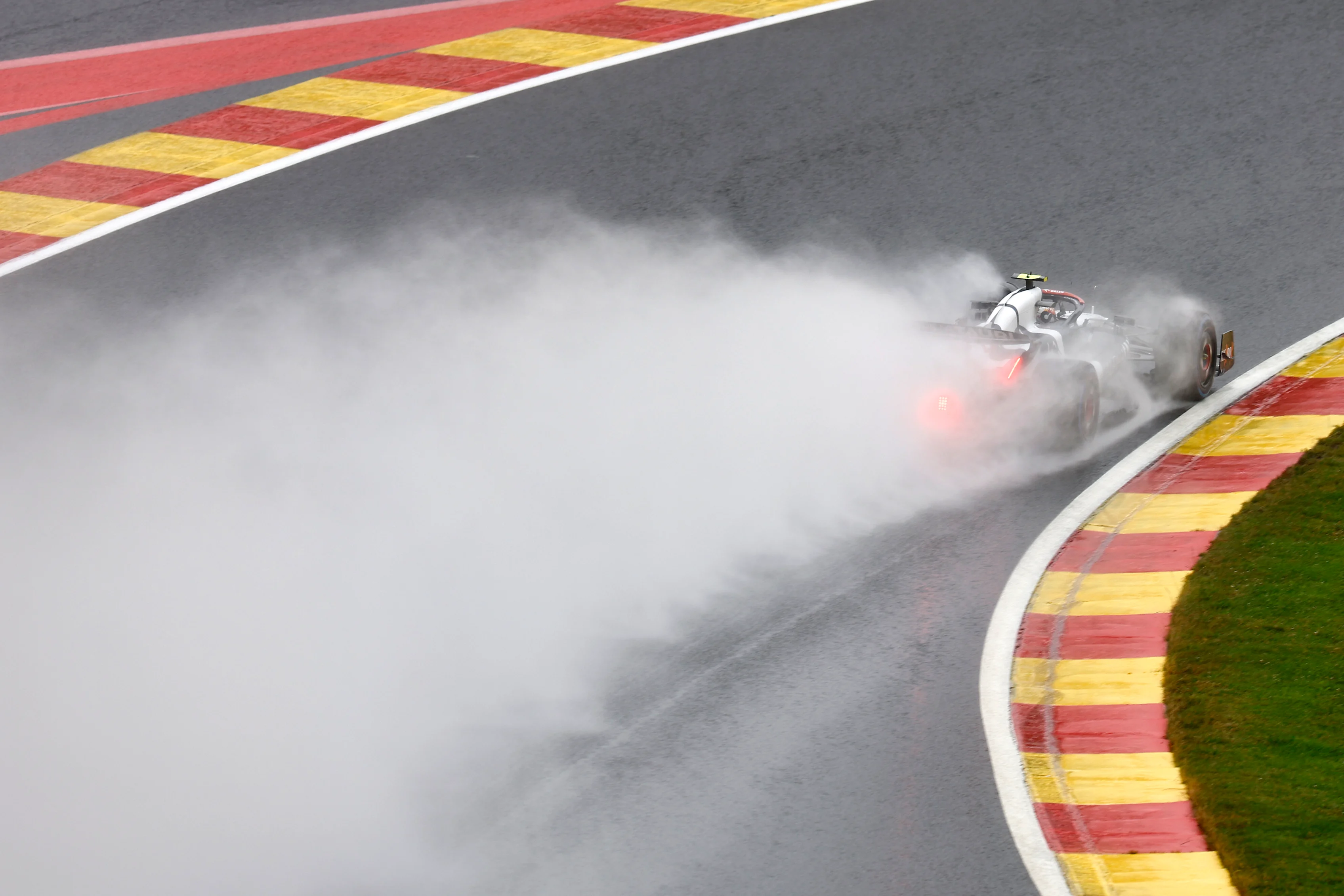 SPA, BELGIUM - JULY 28: Yuki Tsunoda of Japan driving the (22) Scuderia AlphaTauri AT04 in the rain