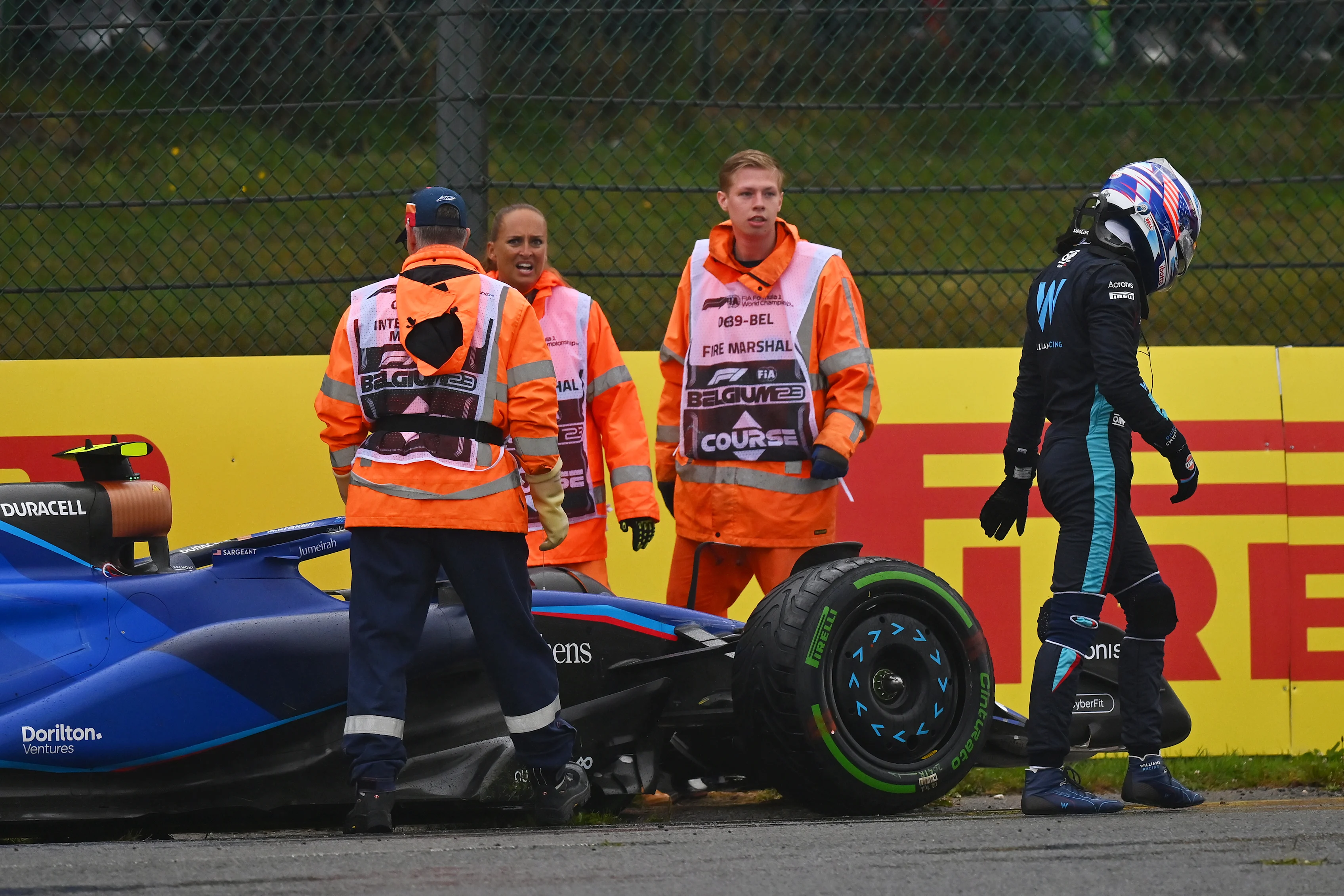 SPA, BELGIUM - JULY 28: Logan Sargeant of United States and Williams walks from his car after stopping on track during practice ahead of the F1 Grand Prix of Belgium at Circuit de Spa-Francorchamps on July 28, 2023 in Spa, Belgium. (Photo by Dan Mullan/Getty Images)