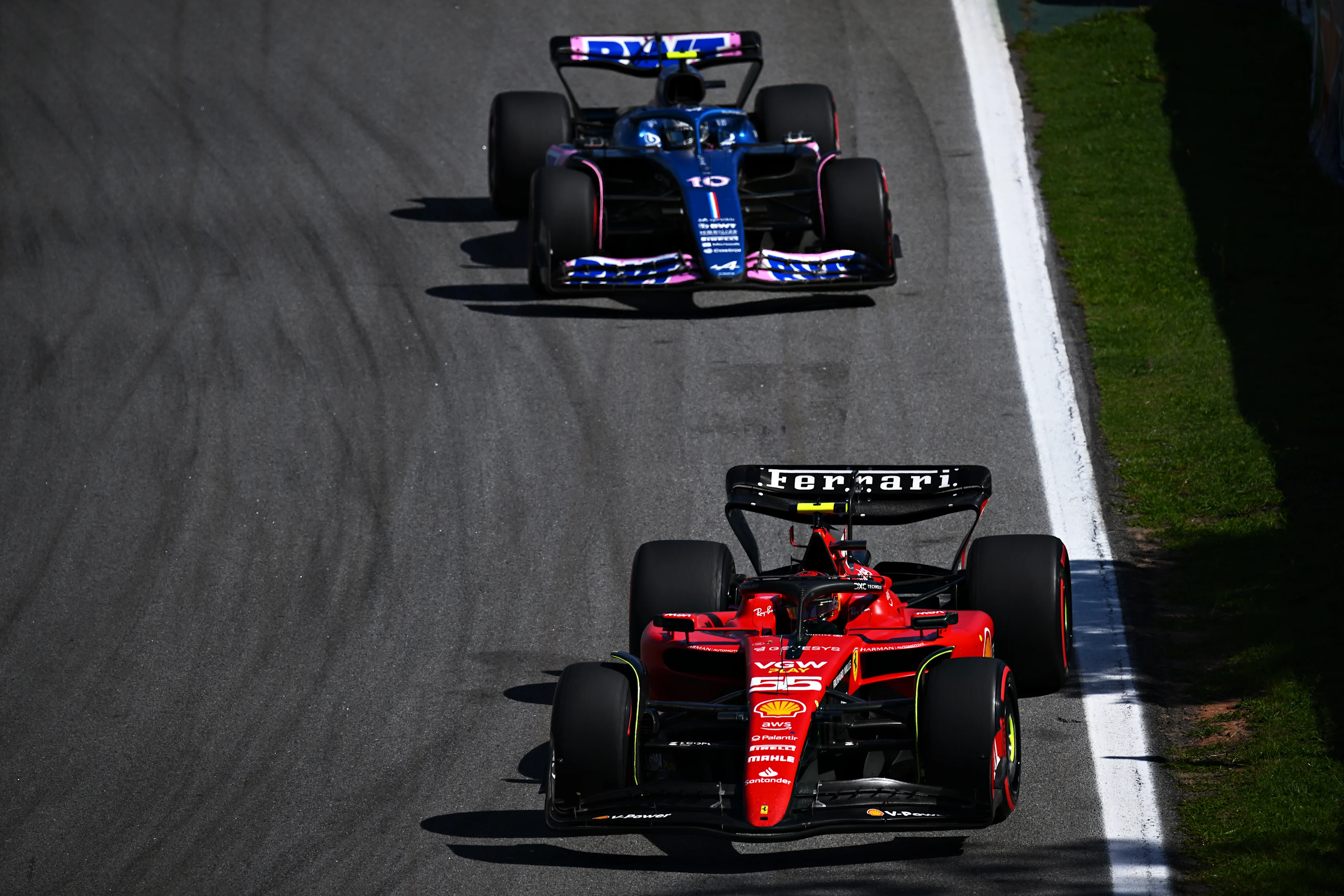 SAO PAULO, BRAZIL - NOVEMBER 05: Carlos Sainz of Spain driving (55) the Ferrari SF-23 leads Pierre