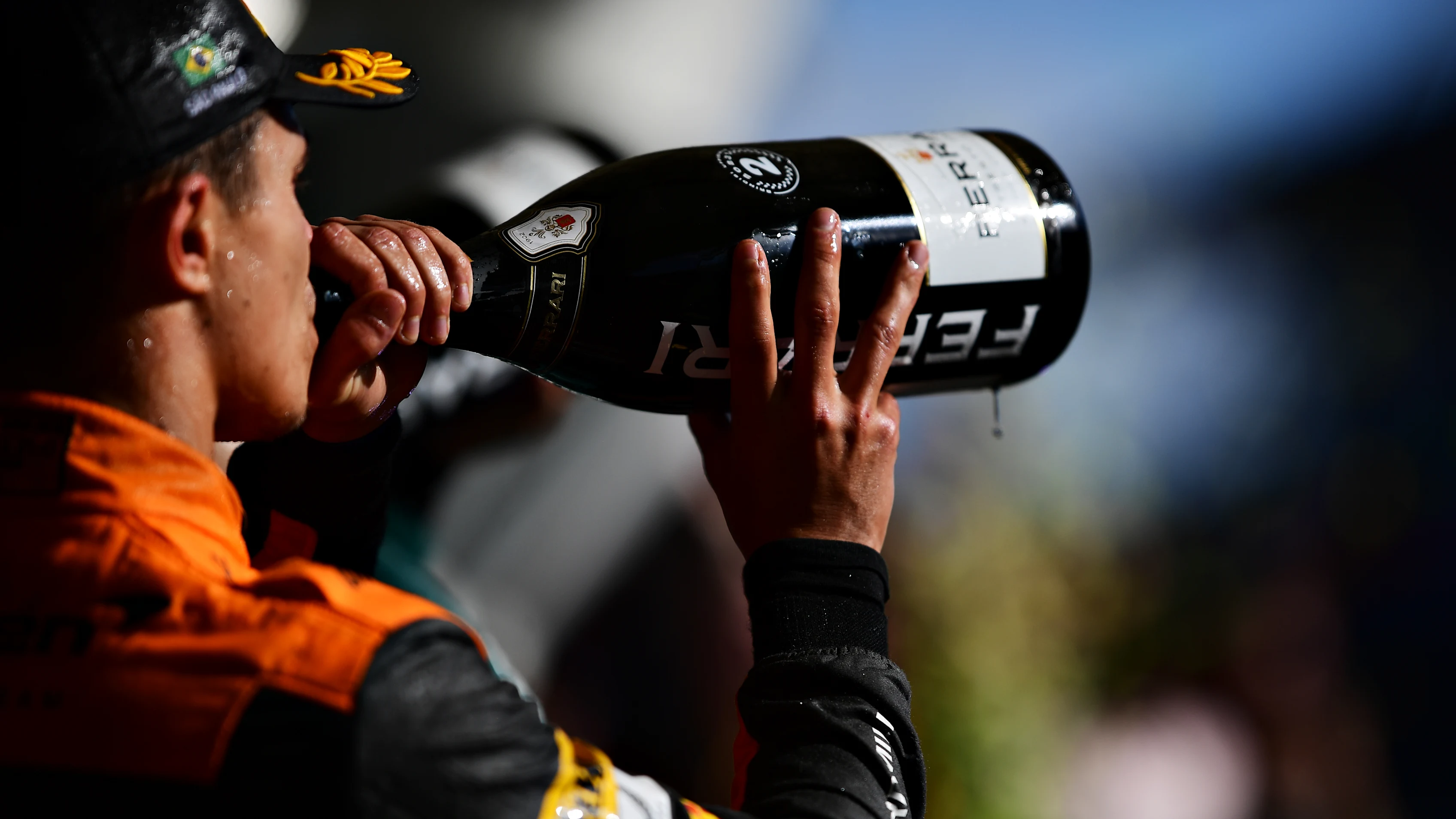 SAO PAULO, BRAZIL - NOVEMBER 05: Second placed Lando Norris of Great Britain and McLaren celebrates on the podium during the F1 Grand Prix of Brazil at Autodromo Jose Carlos Pace on November 05, 2023 in Sao Paulo, Brazil. (Photo by Mario Renzi - Formula 1/Formula 1 via Getty Images)