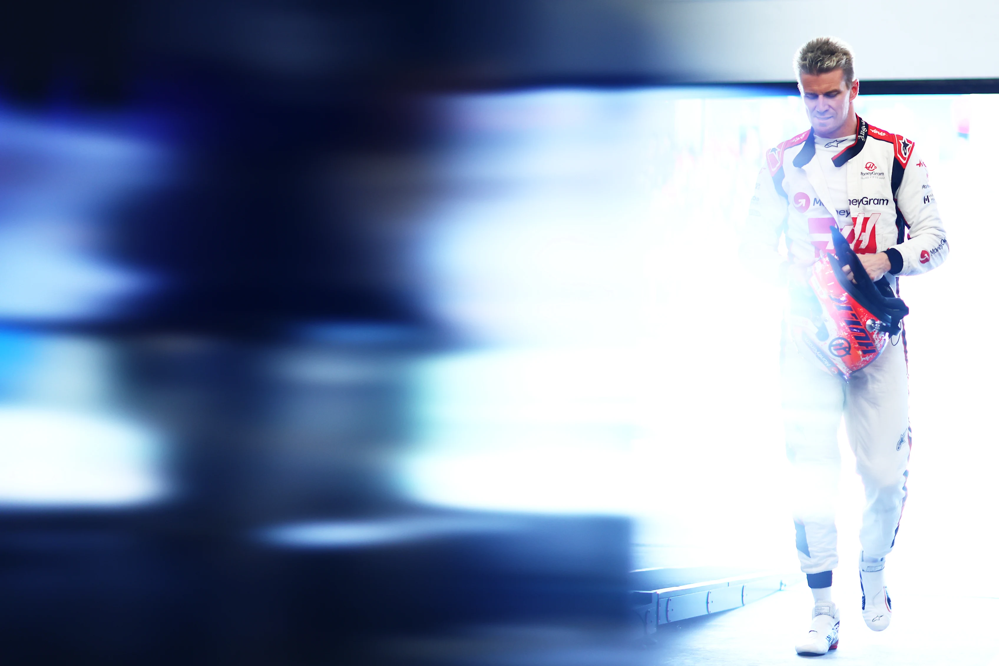 SAO PAULO, BRAZIL - NOVEMBER 04: 12th placed qualifier Nico Hulkenberg of Germany and Haas F1 looks on in the FIA garage during the Sprint Shootout ahead of the F1 Grand Prix of Brazil at Autodromo Jose Carlos Pace on November 04, 2023 in Sao Paulo, Brazil. (Photo by Dan Istitene - Formula 1/Formula 1 via Getty Images)