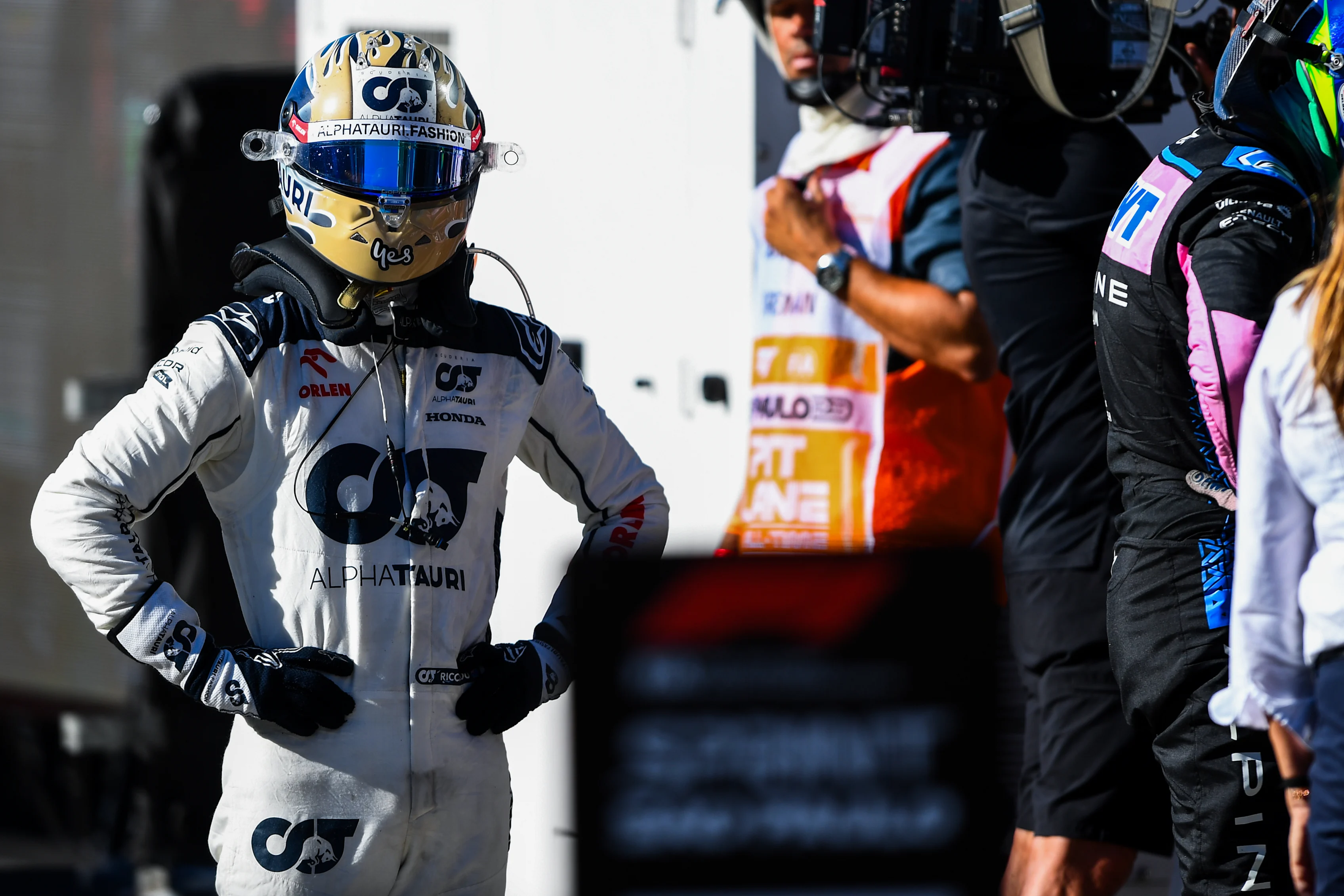 SAO PAULO, BRAZIL - NOVEMBER 04: 9th placed Daniel Ricciardo of Australia and Scuderia AlphaTauri looks on in parc ferme during the Sprint ahead of the F1 Grand Prix of Brazil at Autodromo Jose Carlos Pace on November 04, 2023 in Sao Paulo, Brazil. (Photo by Rudy Carezzevoli/Getty Images)