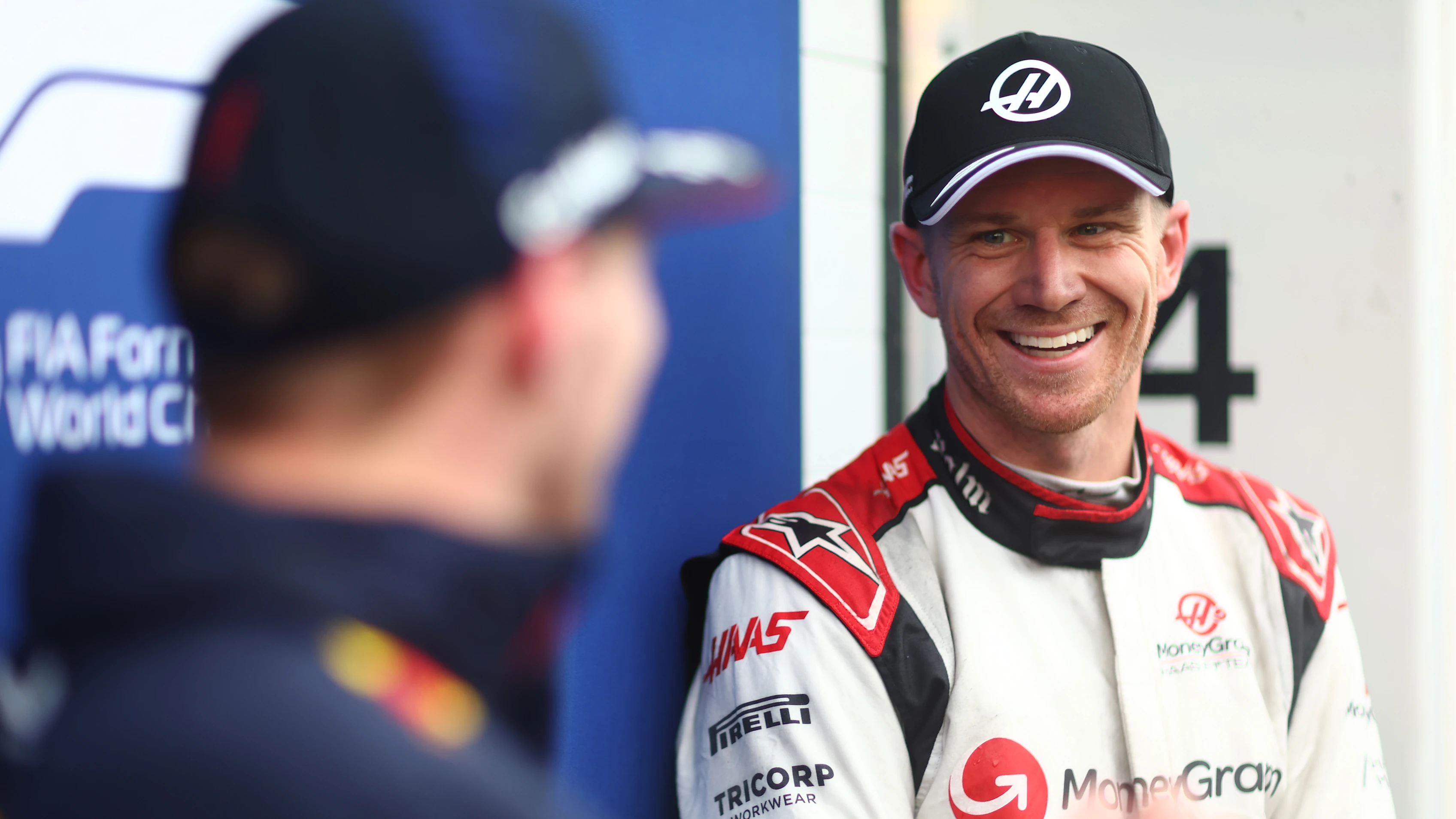 MONTREAL, QUEBEC - JUNE 17: Second placed qualifier Nico Hulkenberg of Germany and Haas F1 talks with Pole position qualifier Max Verstappen of the Netherlands and Oracle Red Bull Racing in parc ferme during qualifying ahead of the F1 Grand Prix of Canada at Circuit Gilles Villeneuve on June 17, 2023 in Montreal, Quebec. (Photo by Dan Istitene - Formula 1/Formula 1 via Getty Images)