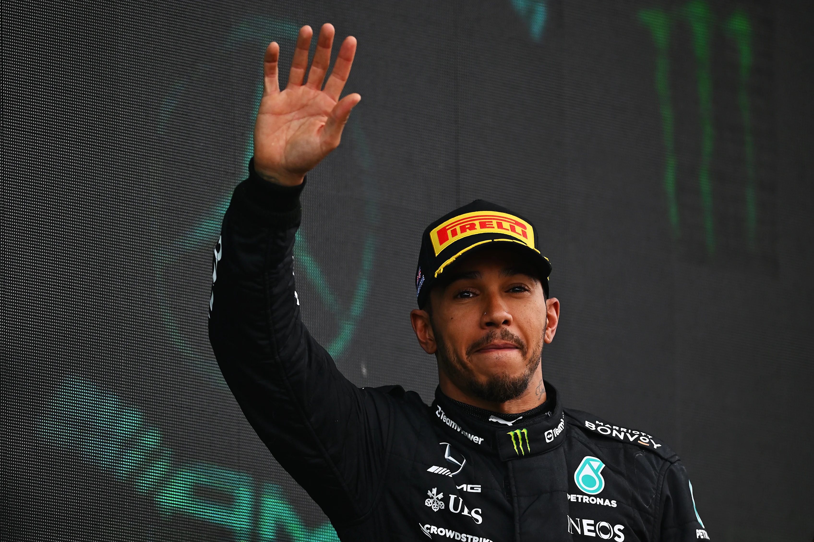 NORTHAMPTON, ENGLAND - JULY 09: Third placed Lewis Hamilton of Great Britain and Mercedes