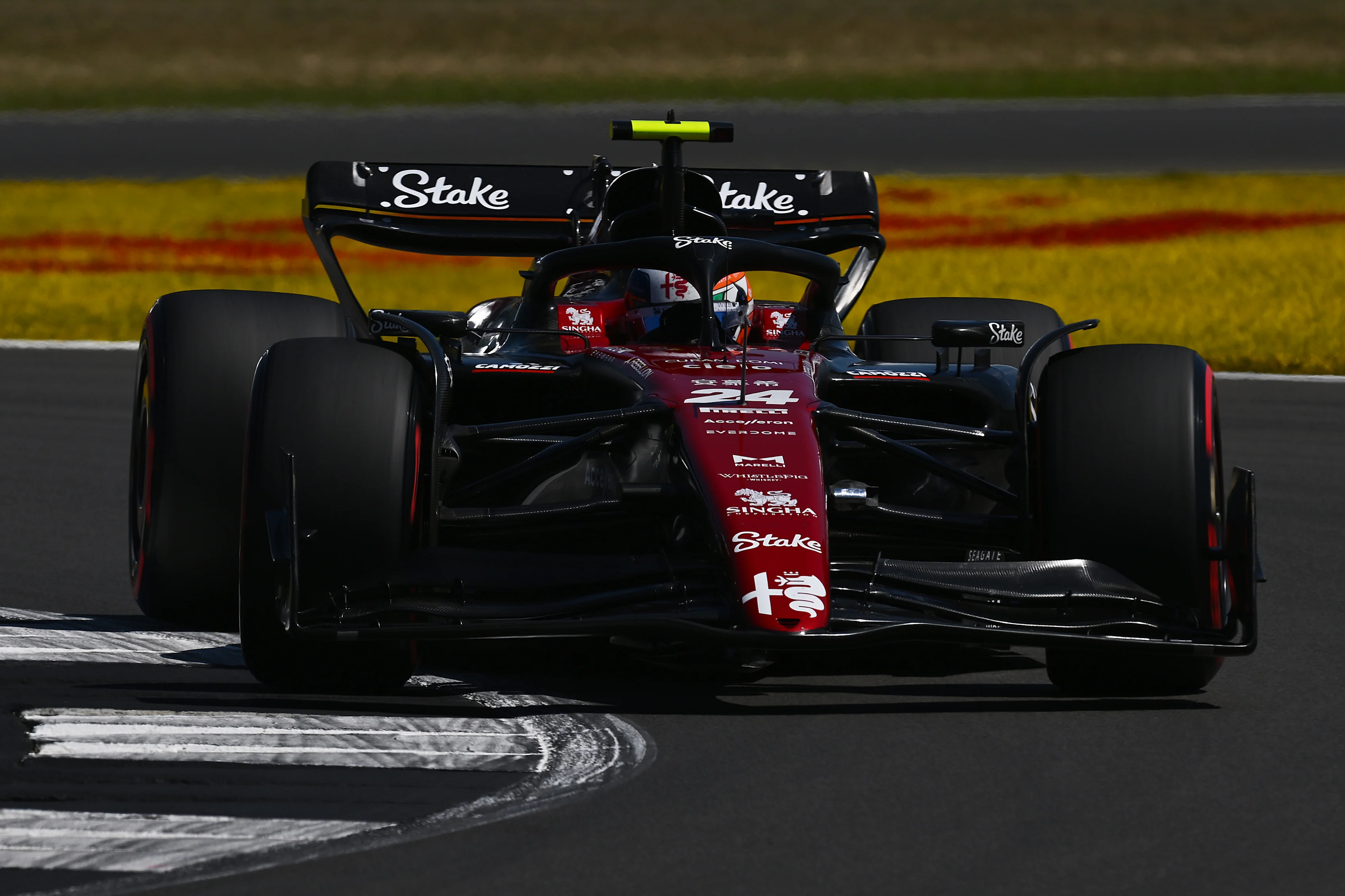 NORTHAMPTON, ENGLAND - JULY 07: Zhou Guanyu of China driving the (24) Alfa Romeo F1 C43 Ferrari on