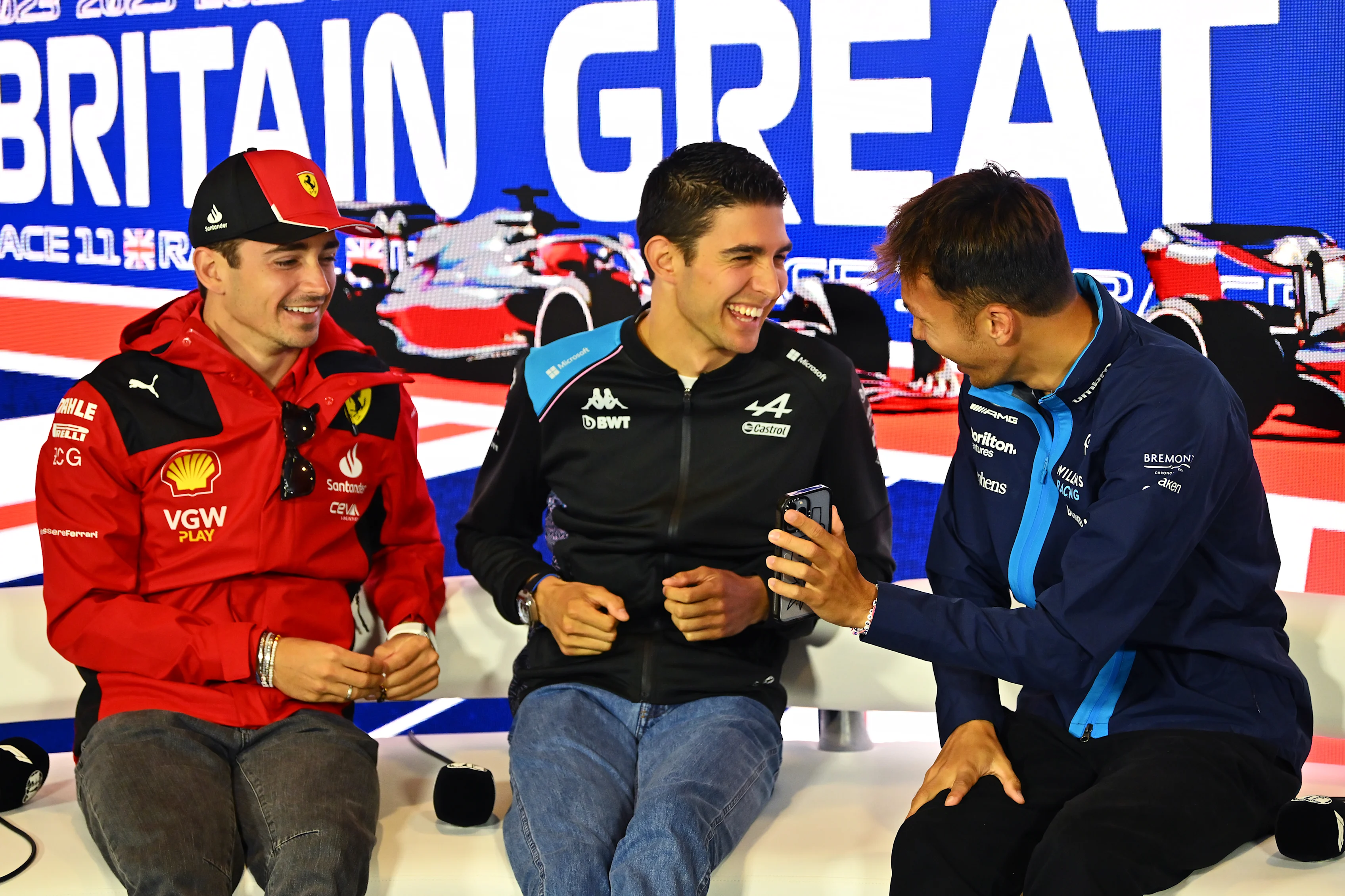 NORTHAMPTON, ENGLAND - JULY 06: Charles Leclerc of Monaco and Ferrari, Esteban Ocon of France and