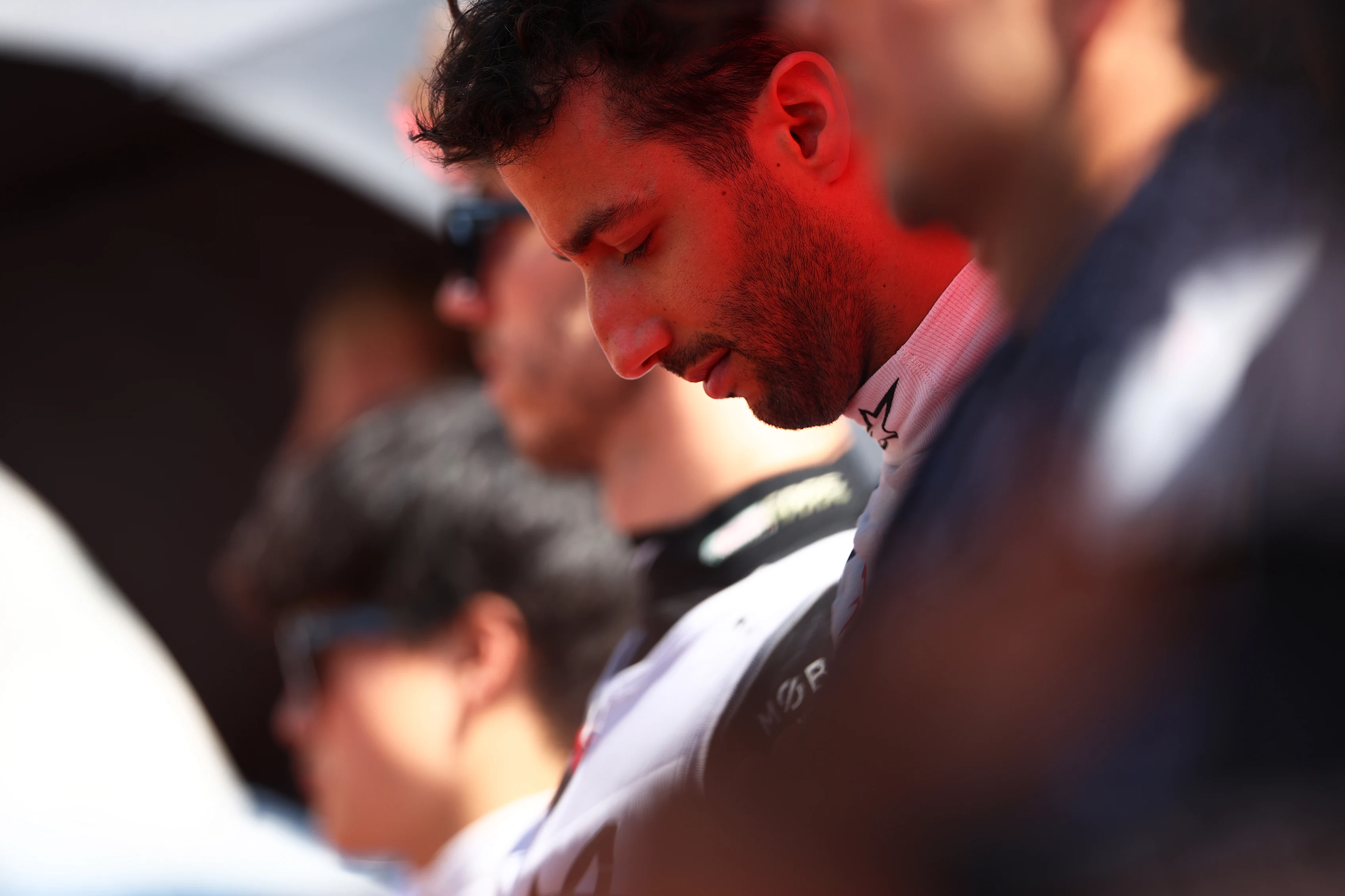 BUDAPEST, HUNGARY - JULY 23: Daniel Ricciardo of Australia and Scuderia AlphaTauri looks on on the grid during the F1 Grand Prix of Hungary at Hungaroring on July 23, 2023 in Budapest, Hungary. (Photo by Dan Istitene - Formula 1/Formula 1 via Getty Images)