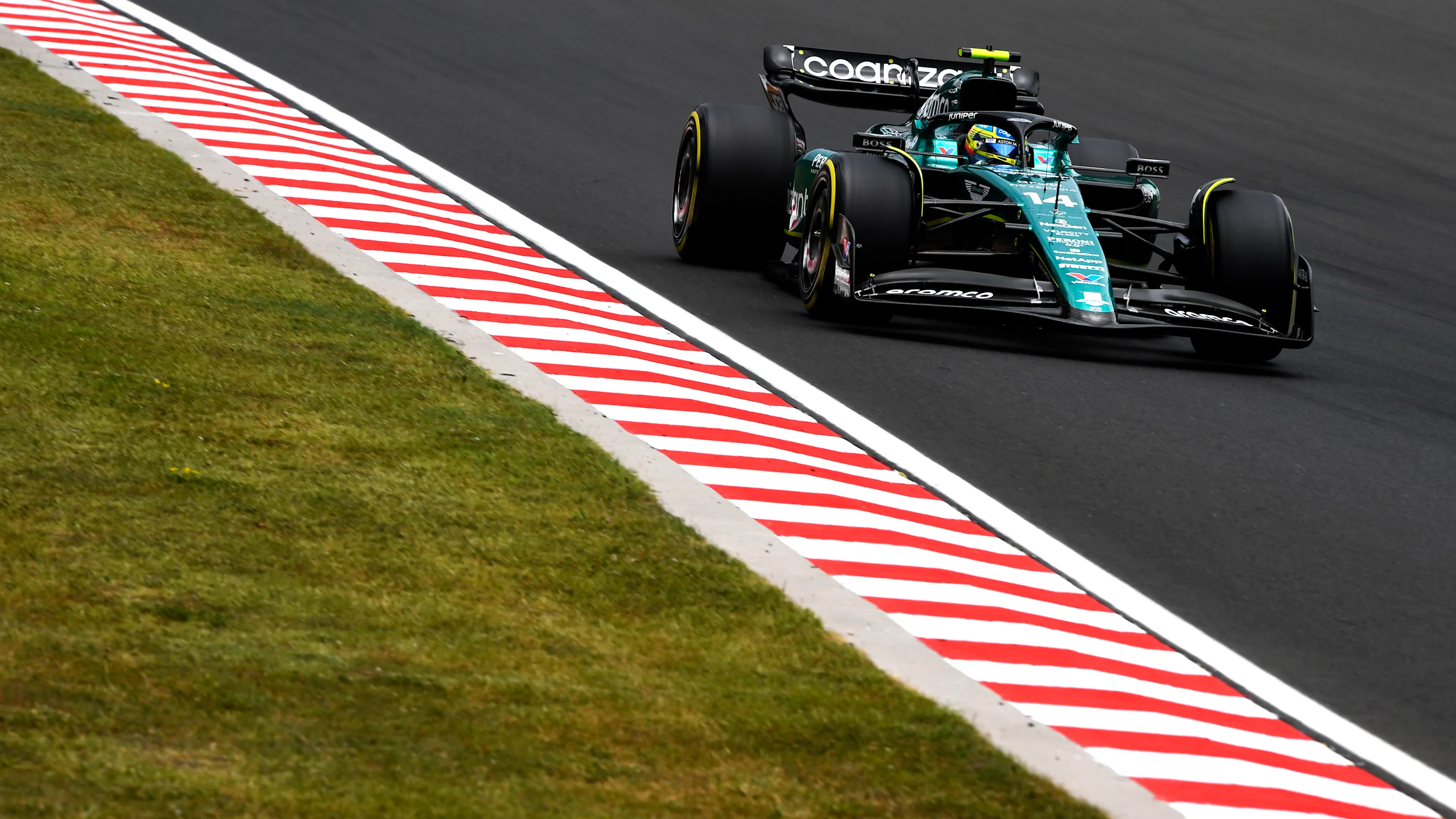 BUDAPEST, HUNGARY - JULY 21: Fernando Alonso of Spain driving the (14) Aston Martin AMR23 Mercedes on track during practice ahead of the F1 Grand Prix of Hungary at Hungaroring on July 21, 2023 in Budapest, Hungary. (Photo by Rudy Carezzevoli - Formula 1/Formula 1 via Getty Images)