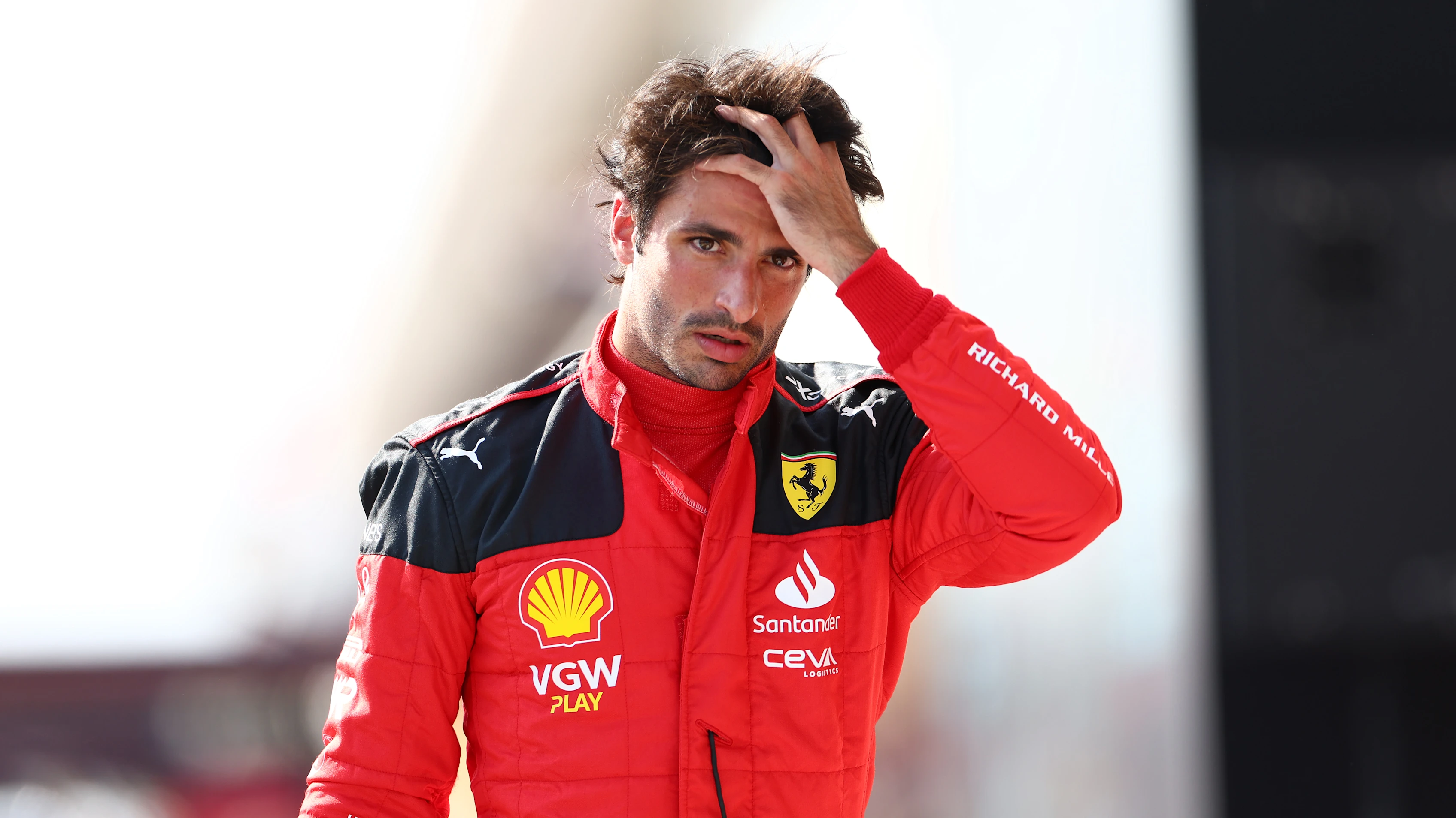 BUDAPEST, HUNGARY - JULY 22: 11th placed qualifier Carlos Sainz of Spain and Ferrari looks on in the Pitlane during qualifying ahead of the F1 Grand Prix of Hungary at Hungaroring on July 22, 2023 in Budapest, Hungary. (Photo by Dan Istitene - Formula 1/Formula 1 via Getty Images)