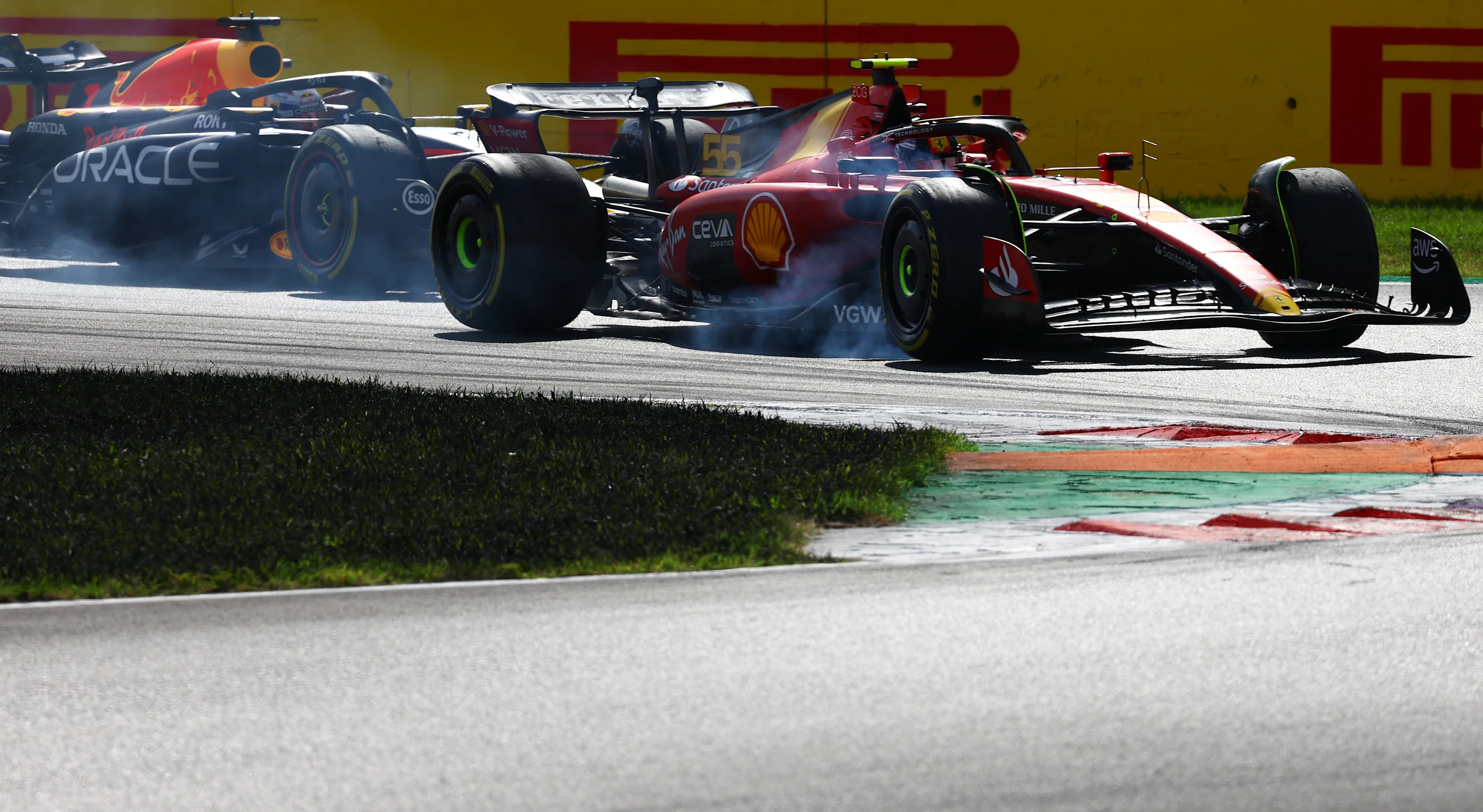 MONZA, ITALY - SEPTEMBER 03: Carlos Sainz of Spain driving (55) the Ferrari SF-23 locks a wheel