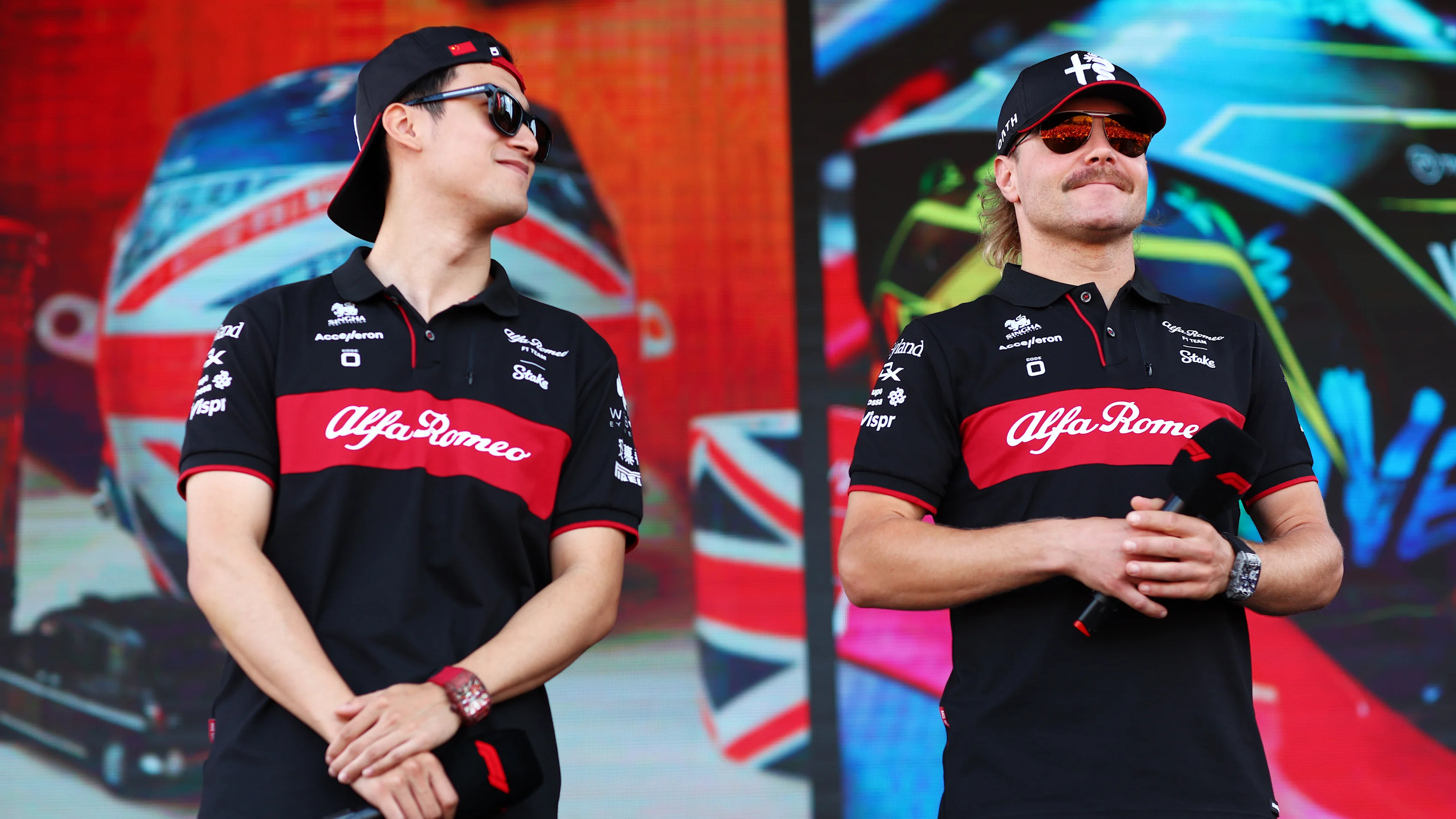 MONZA, ITALY - SEPTEMBER 01: Zhou Guanyu of China and Alfa Romeo F1 and Valtteri Bottas of Finland