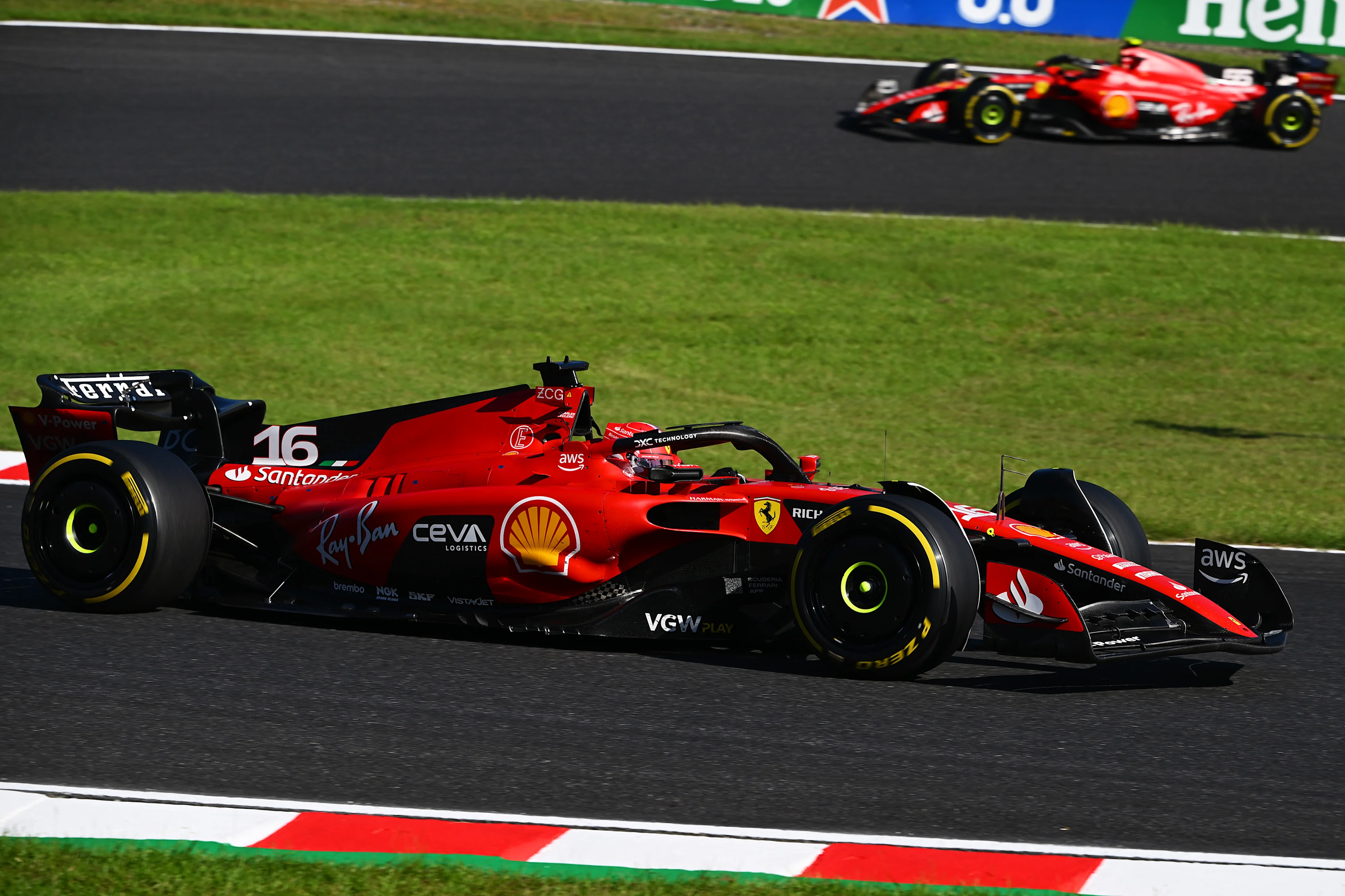 SUZUKA, JAPAN - SEPTEMBER 24: Charles Leclerc of Monaco driving the (16) Ferrari SF-23 leads Carlos Sainz of Spain driving (55) the Ferrari SF-23 during the F1 Grand Prix of Japan at Suzuka International Racing Course on September 24, 2023 in Suzuka, Japan. (Photo by Clive Mason/Getty Images)