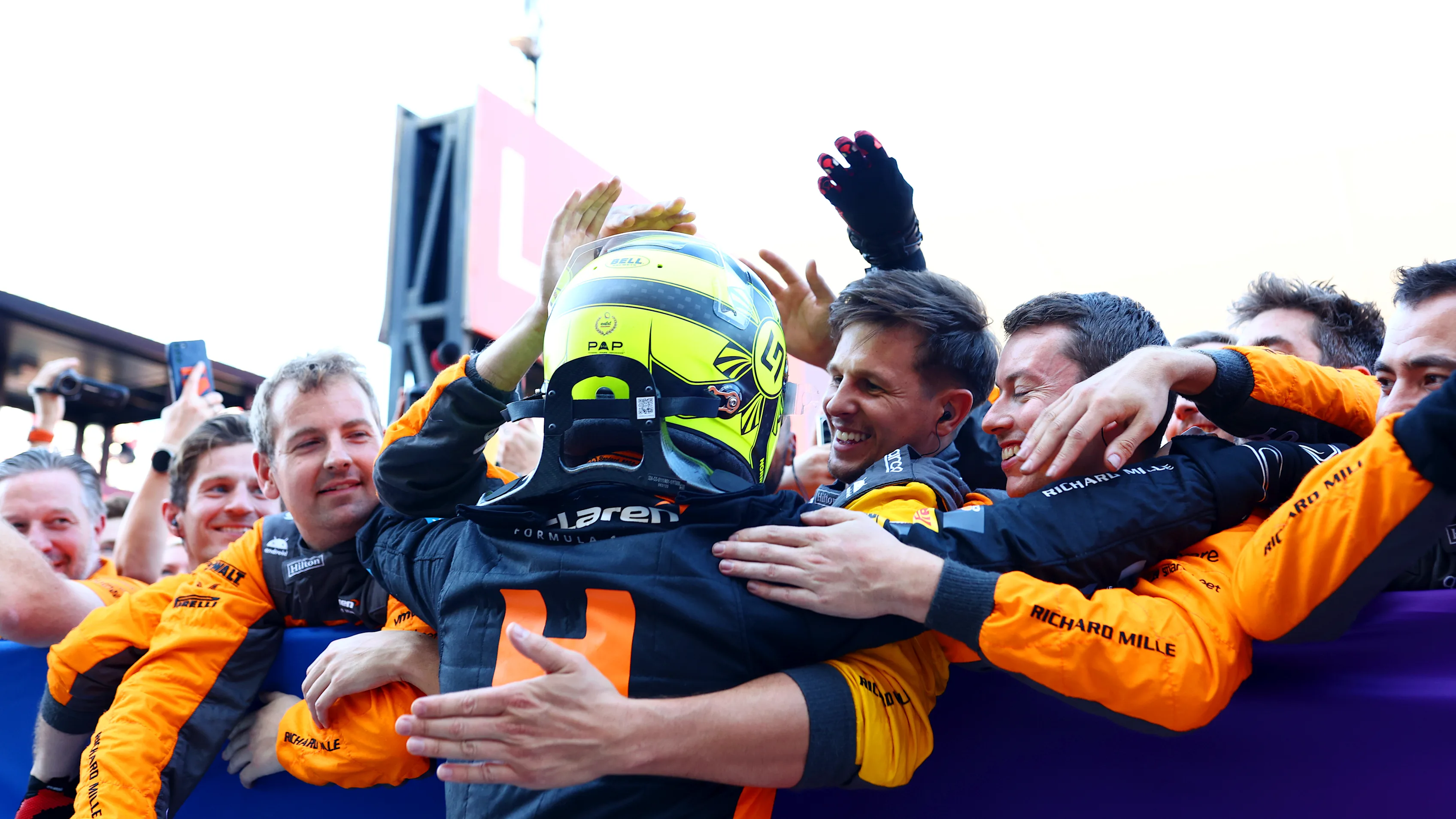 SUZUKA, JAPAN - SEPTEMBER 24: Second placed Lando Norris of Great Britain and McLaren celebrates with his team in parc ferme during the F1 Grand Prix of Japan at Suzuka International Racing Course on September 24, 2023 in Suzuka, Japan. (Photo by Dan Istitene - Formula 1/Formula 1 via Getty Images)