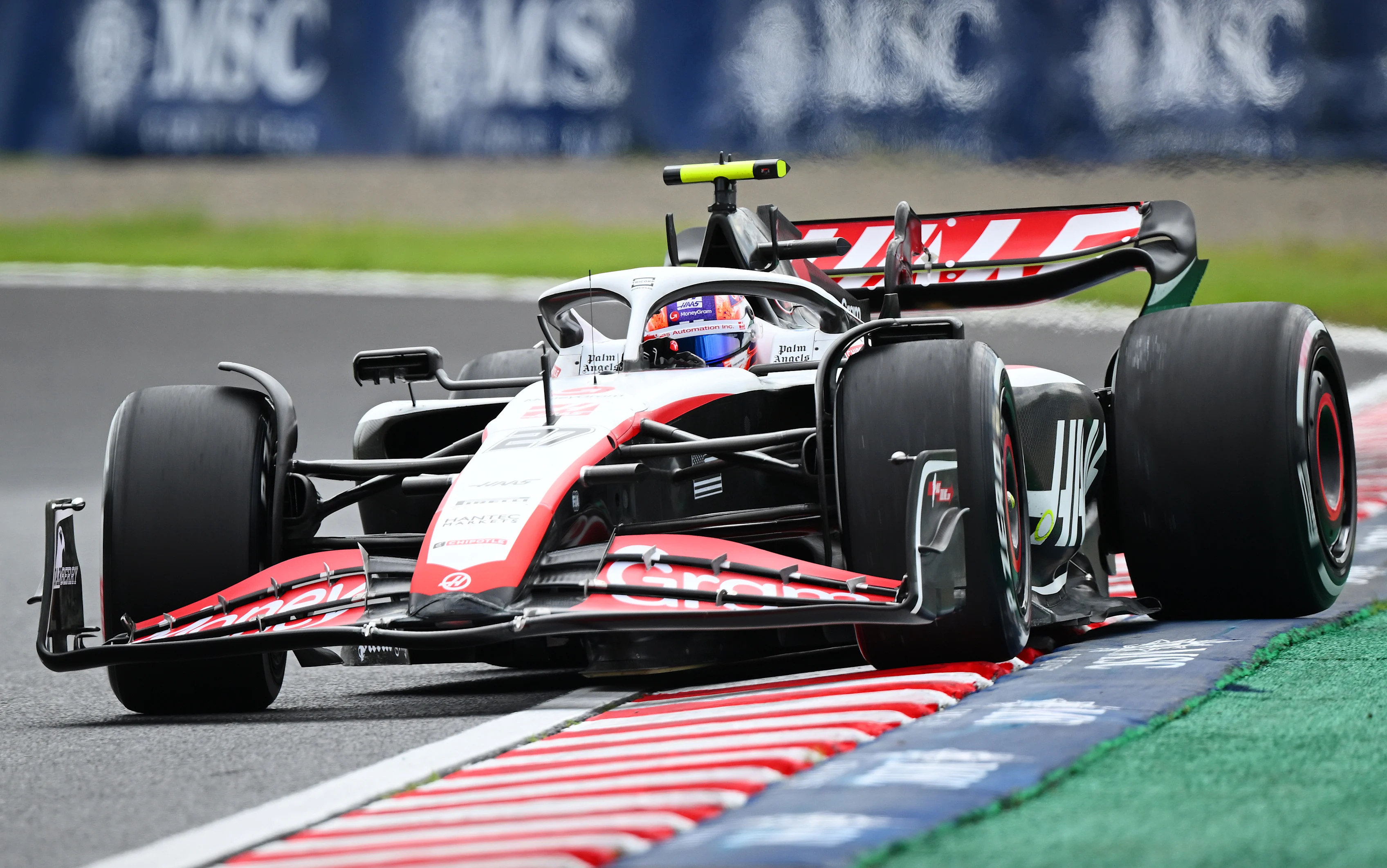 SUZUKA, JAPAN - SEPTEMBER 22: Nico Hulkenberg of Germany driving the (27) Haas F1 VF-23 Ferrari on track during practice ahead of the F1 Grand Prix of Japan at Suzuka International Racing Course on September 22, 2023 in Suzuka, Japan. (Photo by Clive Mason/Getty Images)