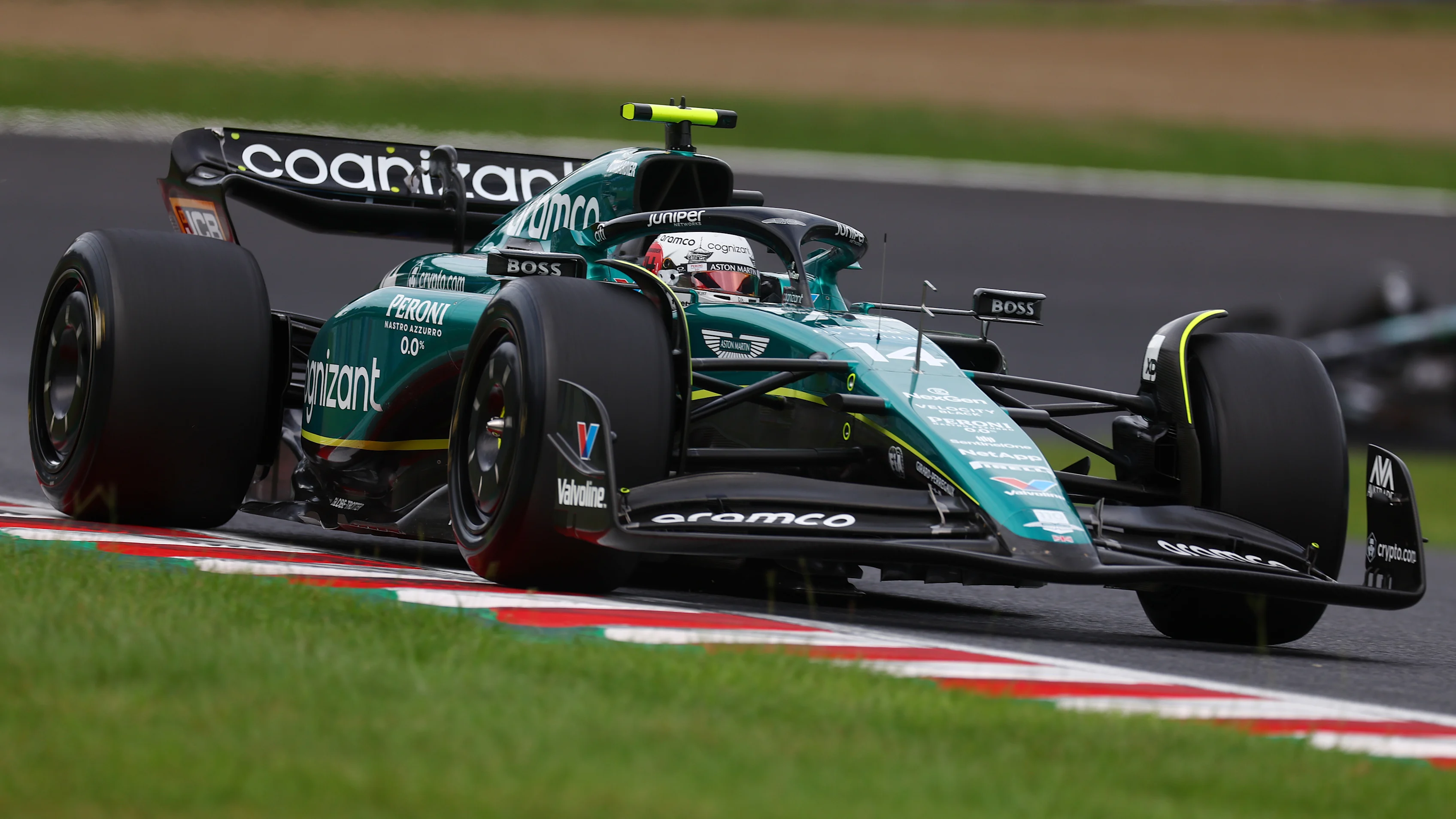 SUZUKA, JAPAN - SEPTEMBER 22: Fernando Alonso of Spain driving the (14) Aston Martin AMR23 Mercedes on track during practice ahead of the F1 Grand Prix of Japan at Suzuka International Racing Course on September 22, 2023 in Suzuka, Japan. (Photo by Bryn Lennon - Formula 1/Formula 1 via Getty Images)