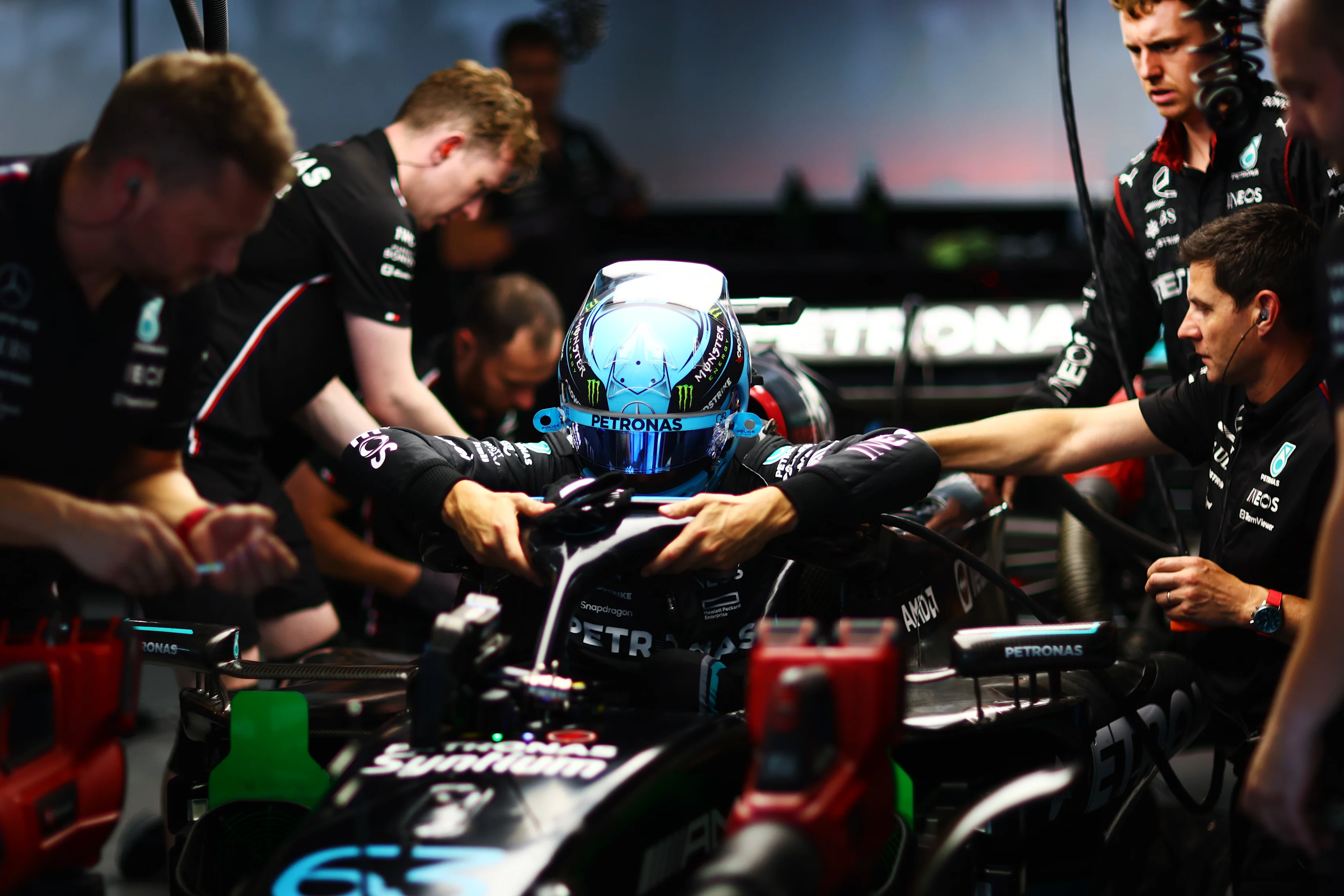 SUZUKA, JAPAN - SEPTEMBER 22: George Russell of Great Britain and Mercedes climbs out of his car in the garage during practice ahead of the F1 Grand Prix of Japan at Suzuka International Racing Course on September 22, 2023 in Suzuka, Japan. (Photo by Dan Istitene - Formula 1/Formula 1 via Getty Images)