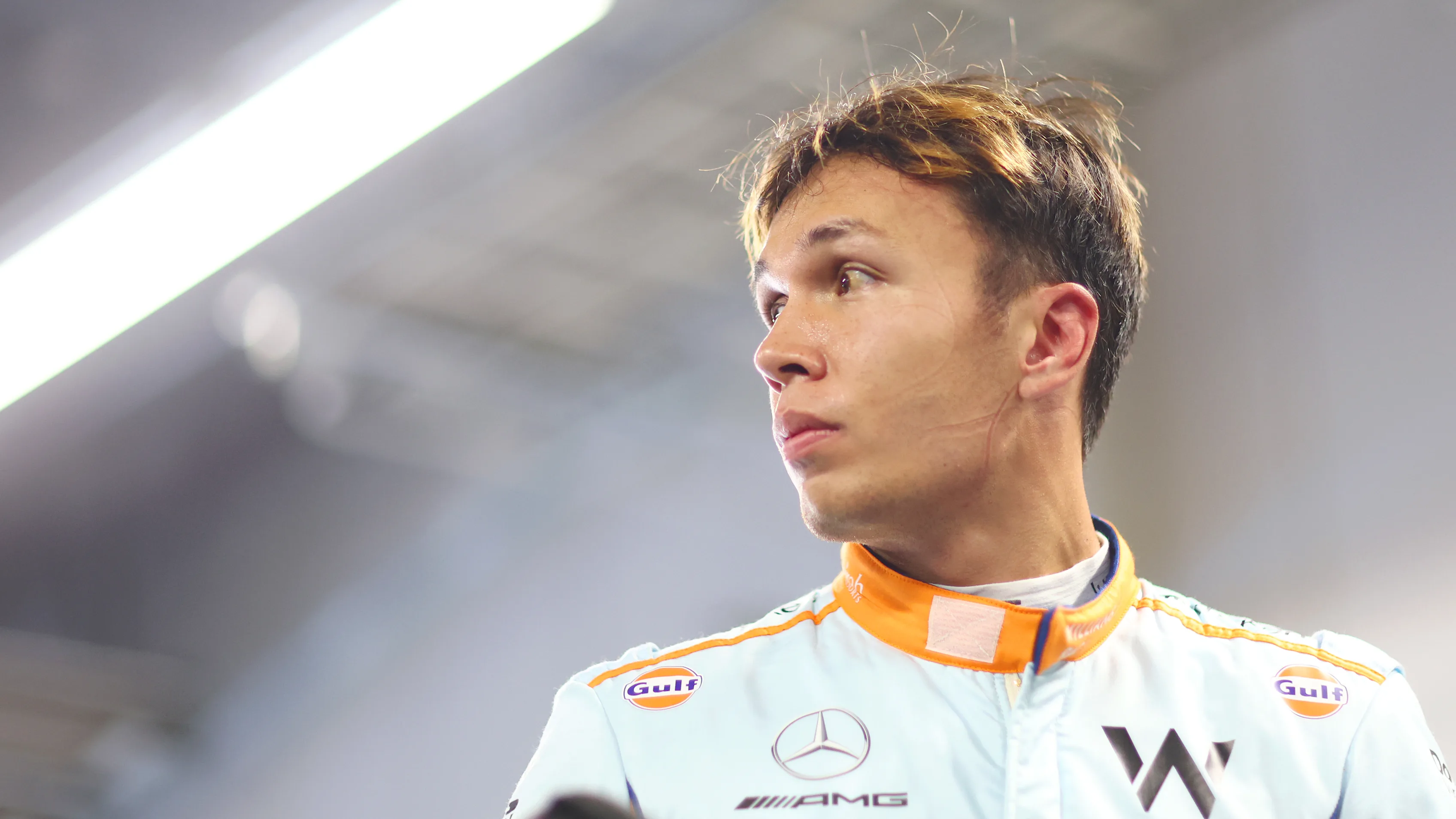 SUZUKA, JAPAN - SEPTEMBER 23: 13th placed qualifier Alexander Albon of Thailand and Williams looks on in the FIA garage during qualifying ahead of the F1 Grand Prix of Japan at Suzuka International Racing Course on September 23, 2023 in Suzuka, Japan. (Photo by Dan Istitene - Formula 1/Formula 1 via Getty Images)