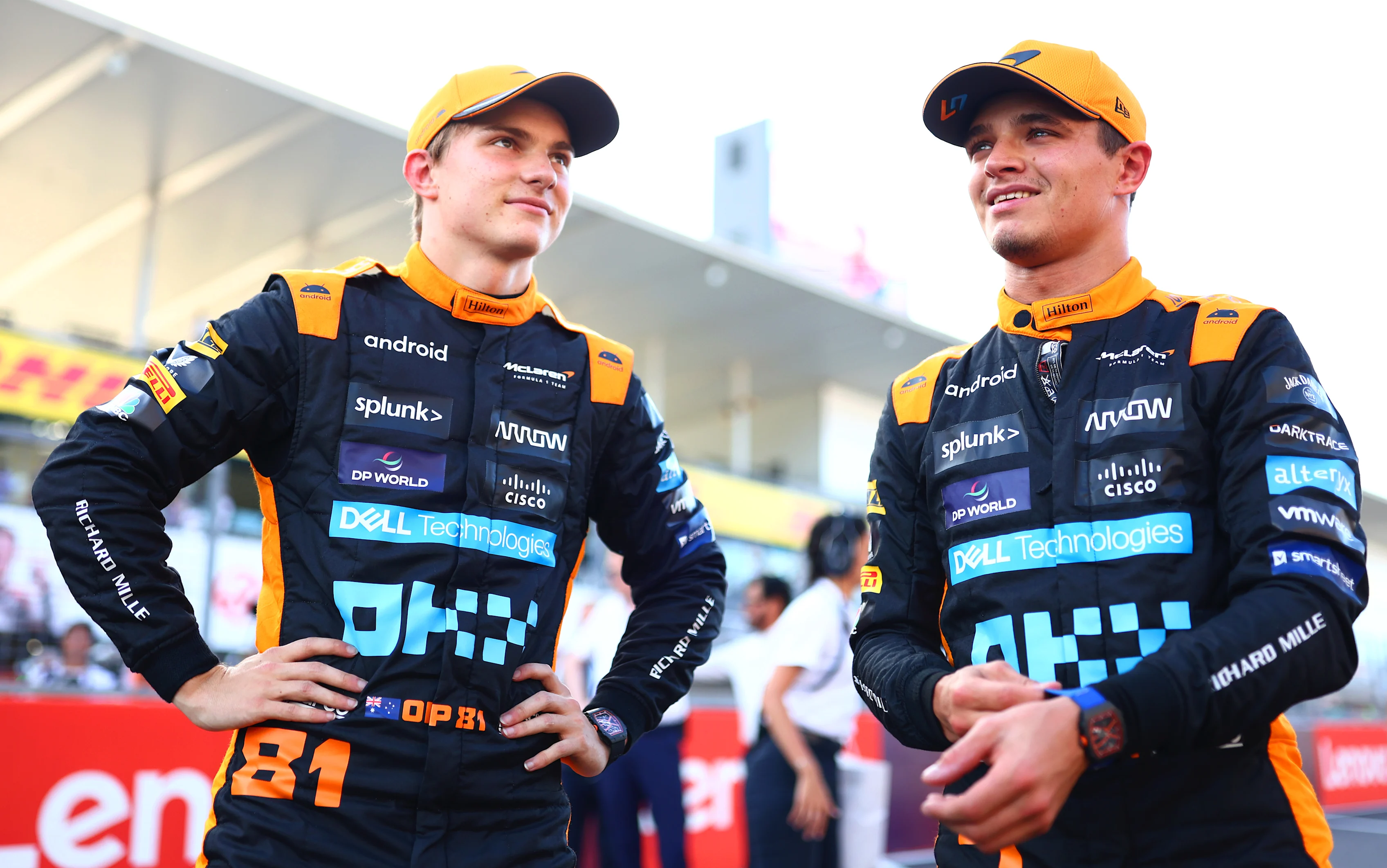 SUZUKA, JAPAN - SEPTEMBER 23:  Second placed qualifier Oscar Piastri of Australia and McLaren talks with Third placed qualifier Lando Norris of Great Britain and McLaren in parc ferme during qualifying ahead of the F1 Grand Prix of Japan at Suzuka International Racing Course on September 23, 2023 in Suzuka, Japan. (Photo by Dan Istitene - Formula 1/Formula 1 via Getty Images)