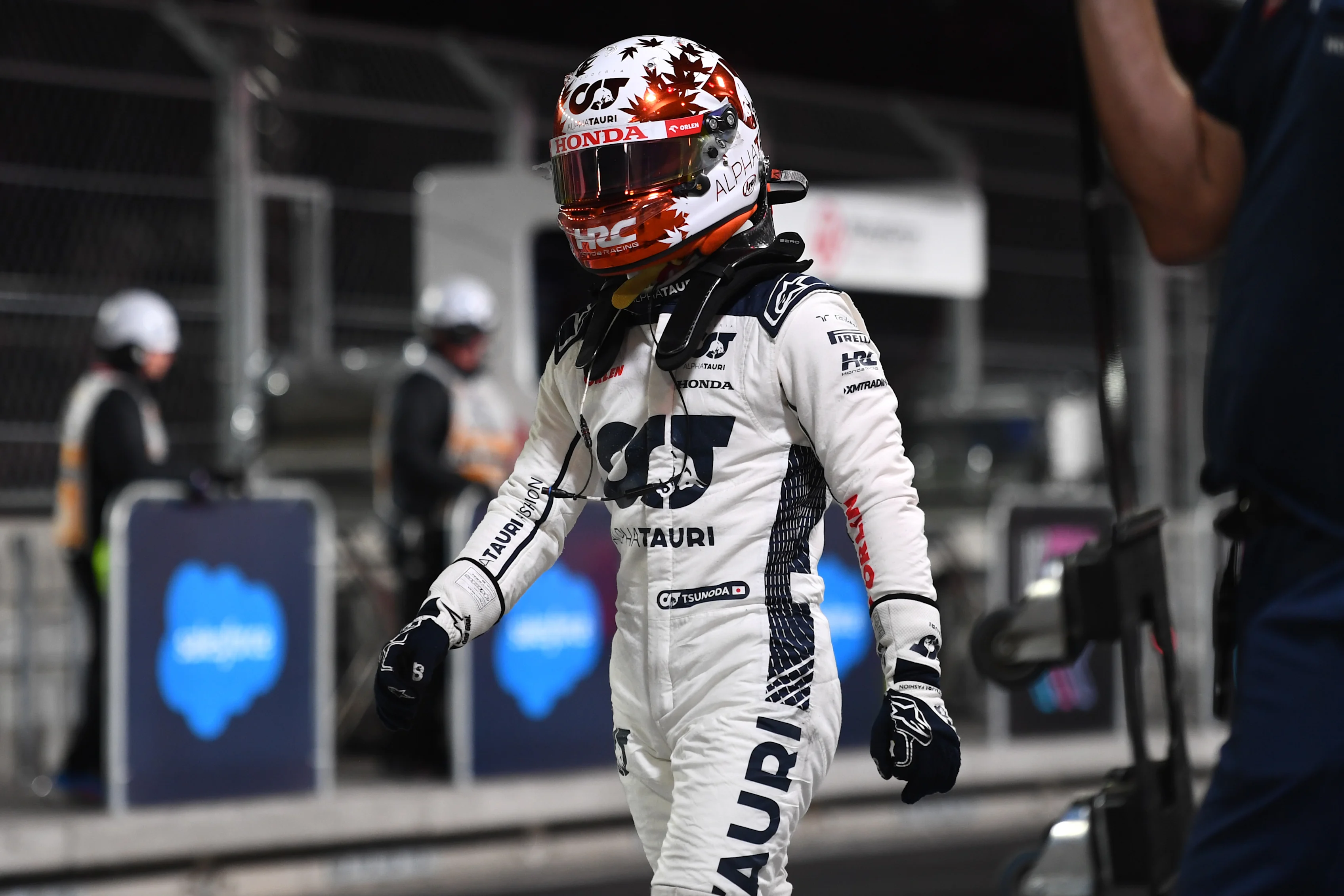 LAS VEGAS, NEVADA - NOVEMBER 18: 20th placed qualifier Yuki Tsunoda of Japan and Scuderia AlphaTauri walks in the pitlane after qualifying ahead of the F1 Grand Prix of Las Vegas at Las Vegas Strip Circuit on November 18, 2023 in Las Vegas, Nevada. (Photo by Rudy Carezzevoli/Getty Images)
