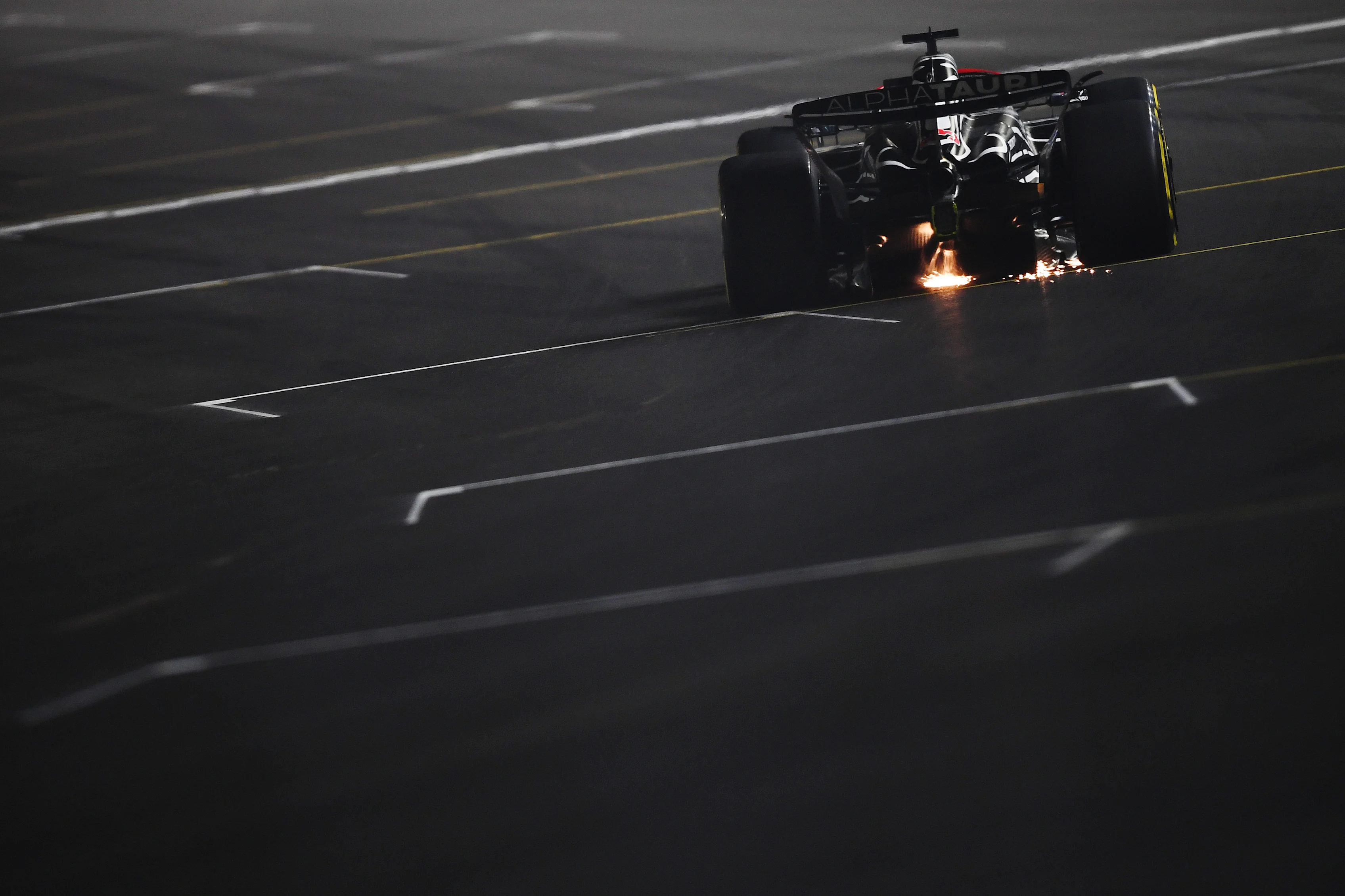 LAS VEGAS, NEVADA - NOVEMBER 18: Daniel Ricciardo of Australia driving the (3) Scuderia AlphaTauri AT04 on track during the F1 Grand Prix of Las Vegas at Las Vegas Strip Circuit on November 18, 2023 in Las Vegas, Nevada. (Photo by Rudy Carezzevoli/Getty Images)