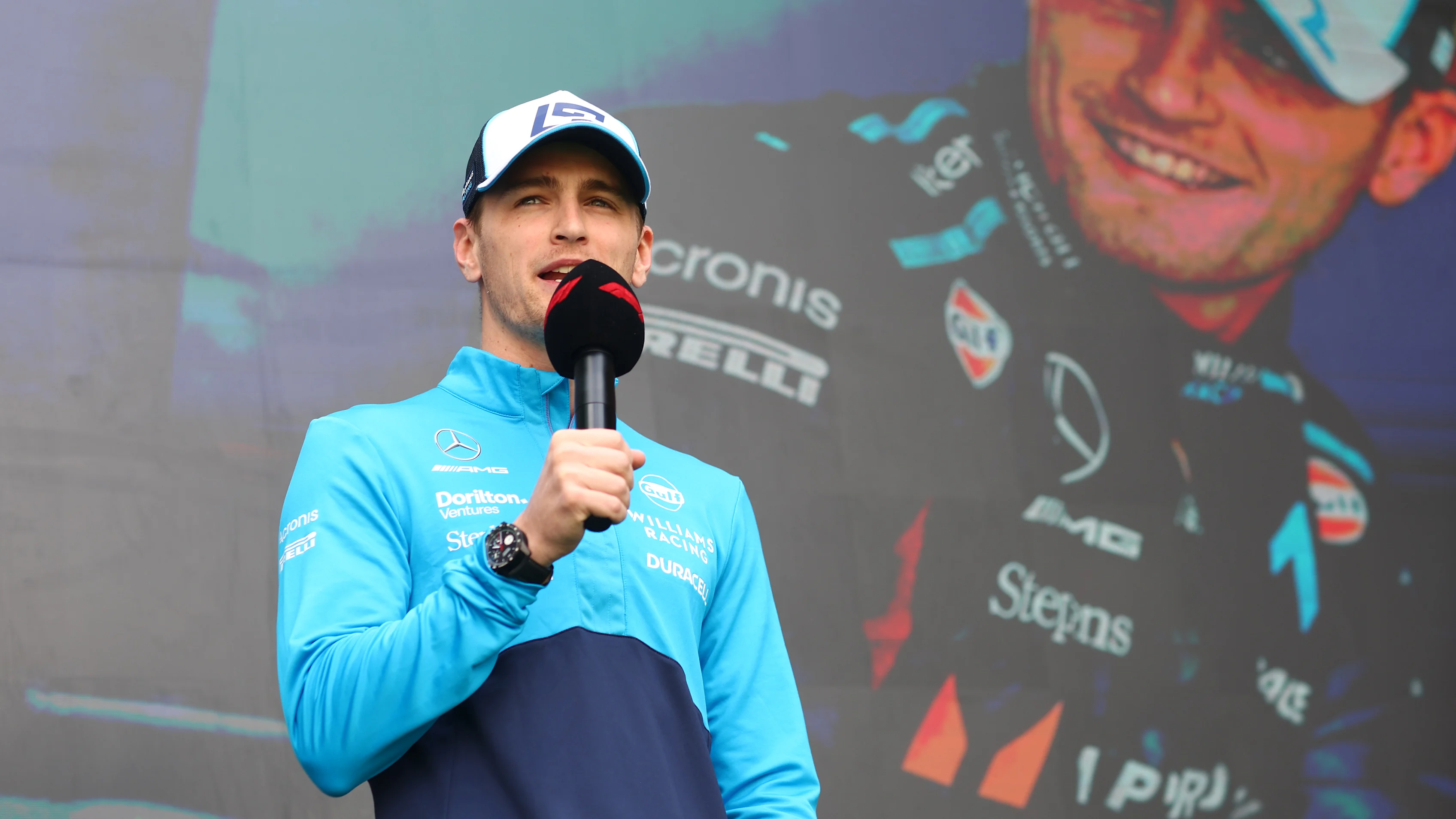 MEXICO CITY, MEXICO - OCTOBER 27: Logan Sargeant of United States and Williams talks to the crowd