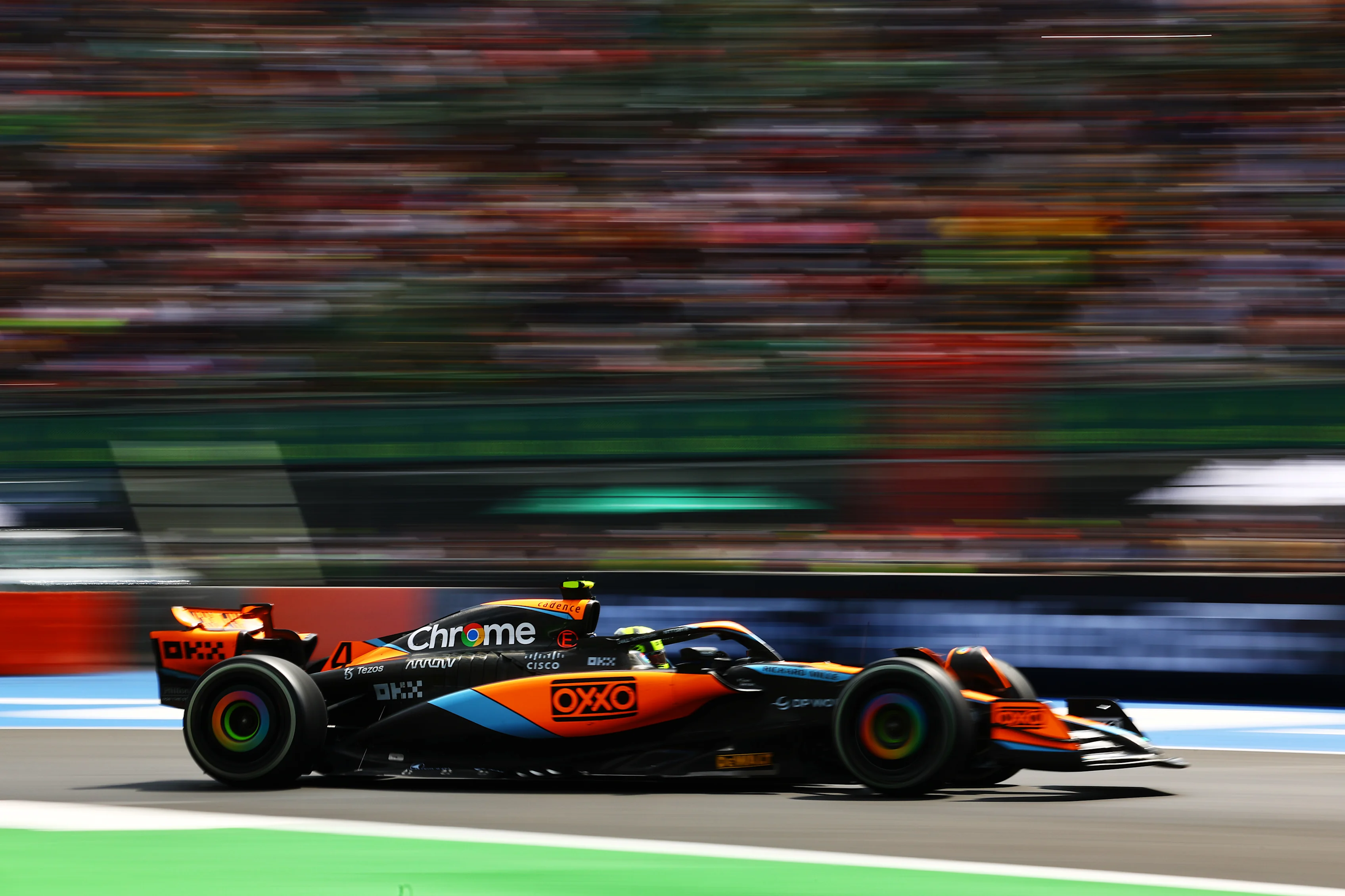 MEXICO CITY, MEXICO - OCTOBER 27: Lando Norris of Great Britain and McLaren walks in the Paddock