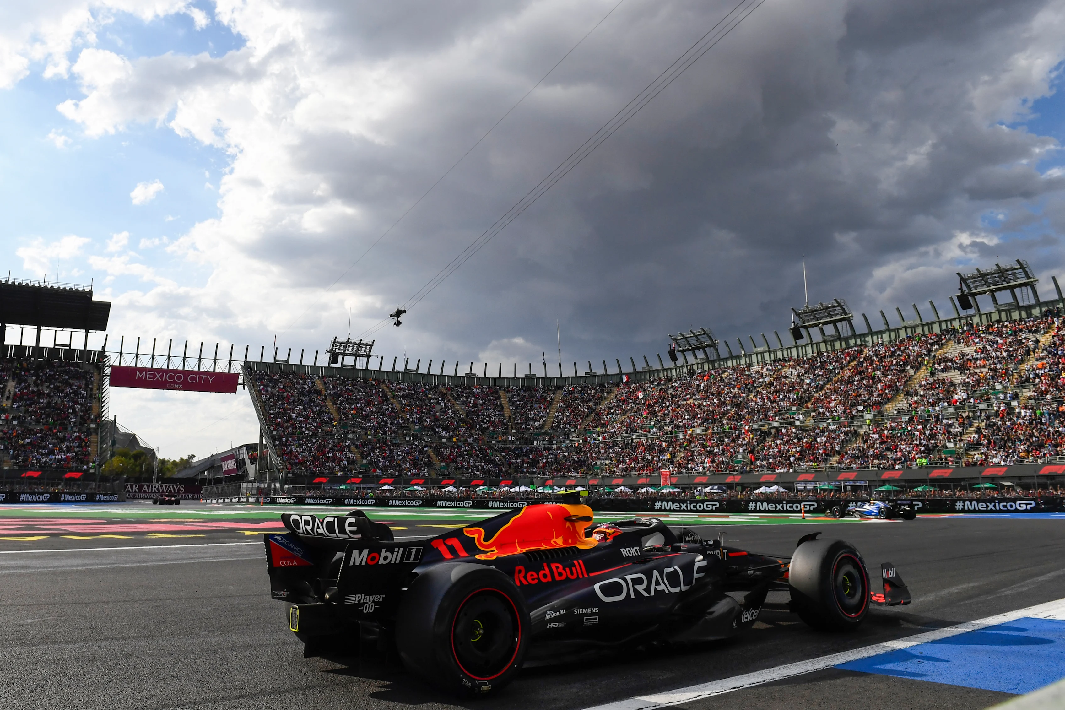 MEXICO CITY, MEXICO - OCTOBER 27: Sergio Perez of Mexico driving the (11) Oracle Red Bull Racing