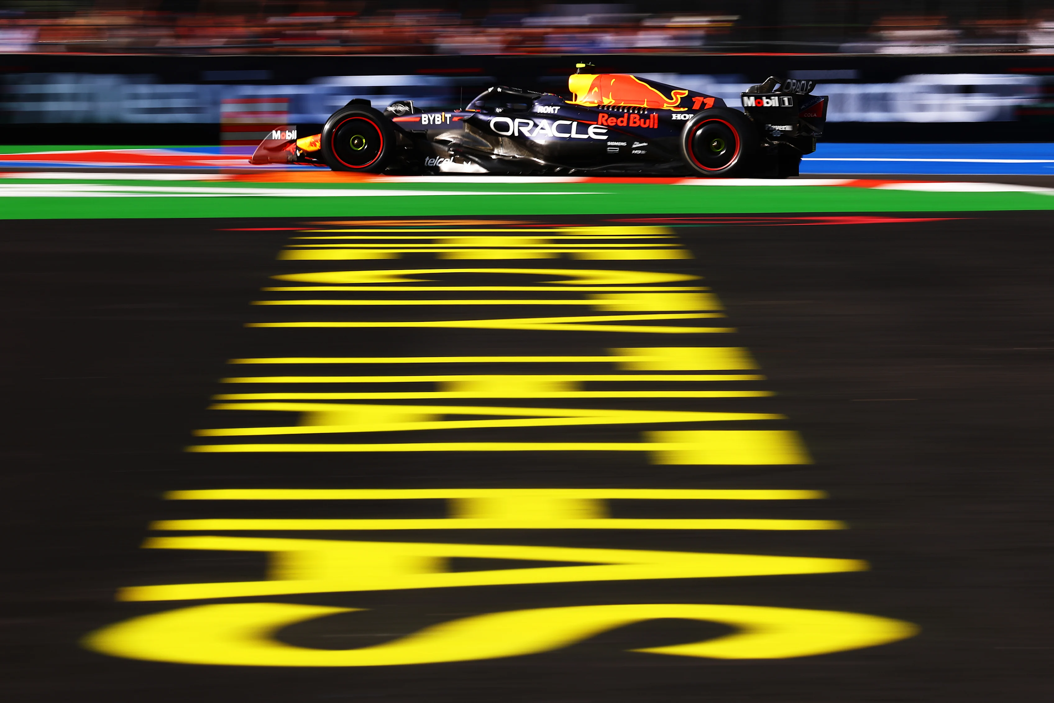 MEXICO CITY, MEXICO - OCTOBER 27: Sergio Perez of Mexico driving the (11) Oracle Red Bull Racing