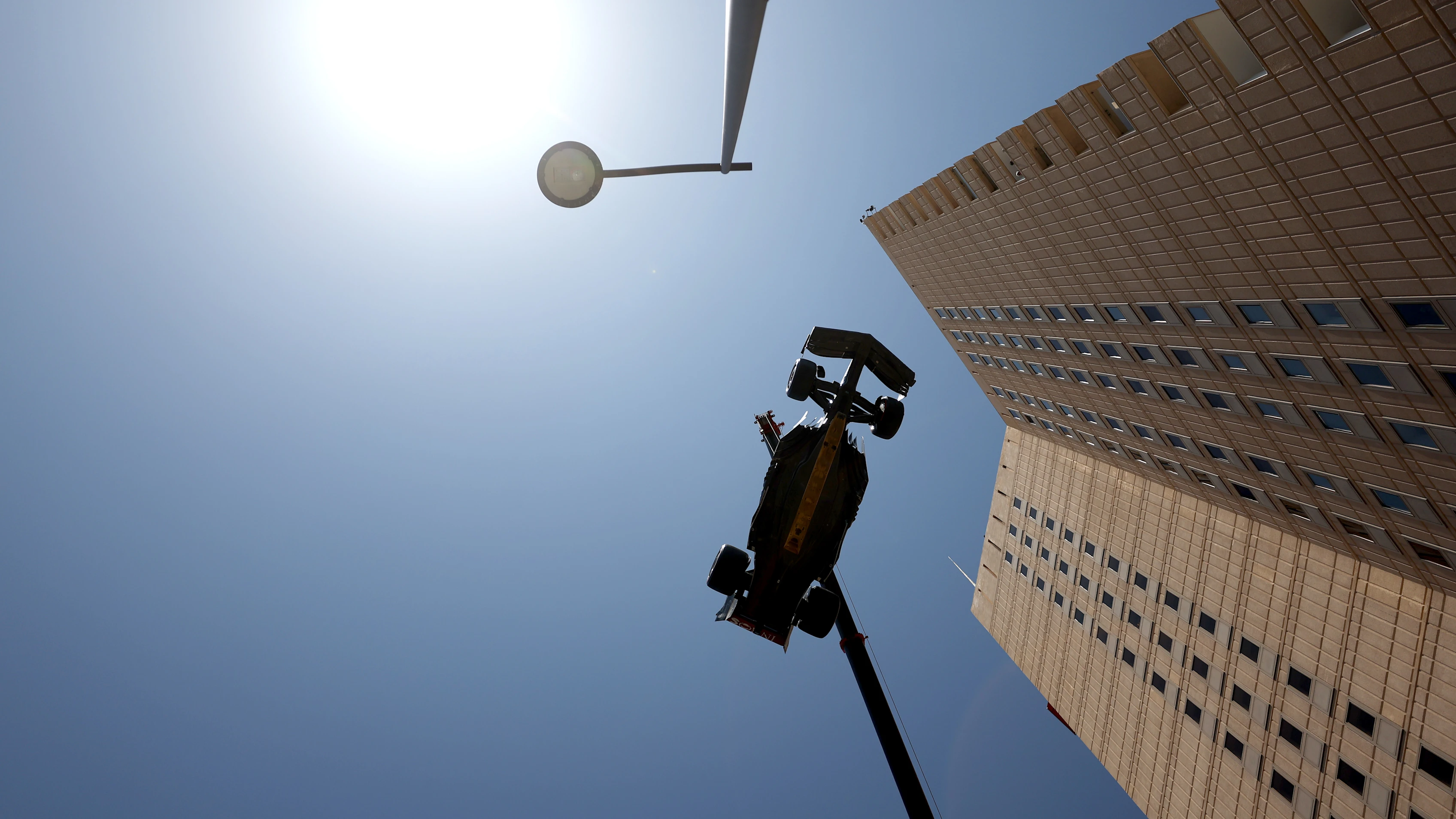 MONTE-CARLO, MONACO - MAY 27: The car of Lewis Hamilton of Great Britain and Mercedes is lifted on a crane after he crashed during final practice ahead of the F1 Grand Prix of Monaco at Circuit de Monaco on May 27, 2023 in Monte-Carlo, Monaco. (Photo by Bryn Lennon - Formula 1/Formula 1 via Getty Images)