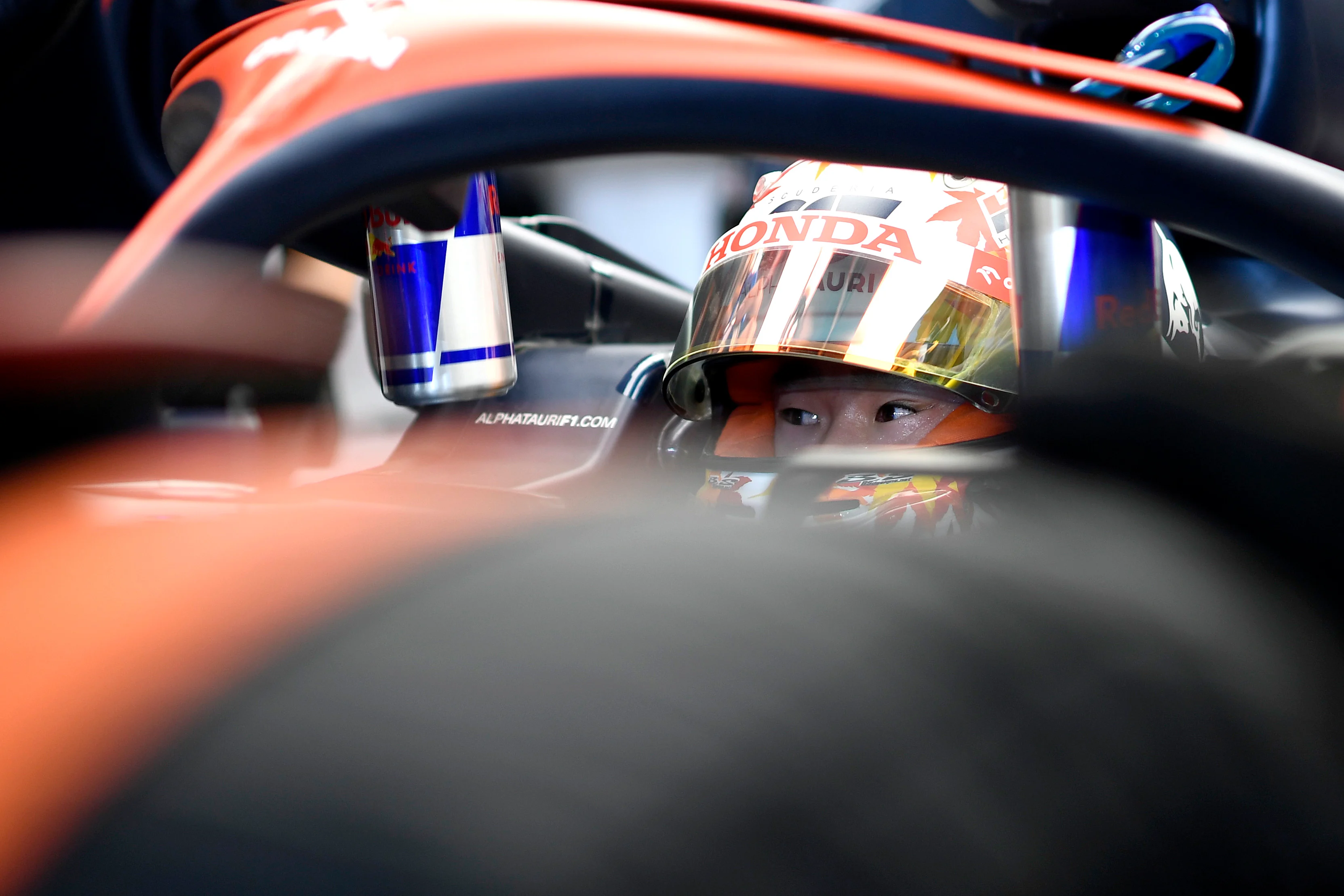 LUSAIL CITY, QATAR - OCTOBER 06: Yuki Tsunoda of Japan and Scuderia AlphaTauri prepares to drive in the garage during qualifying ahead of the F1 Grand Prix of Qatar at Lusail International Circuit on October 06, 2023 in Lusail City, Qatar. (Photo by Rudy Carezzevoli/Getty Images)