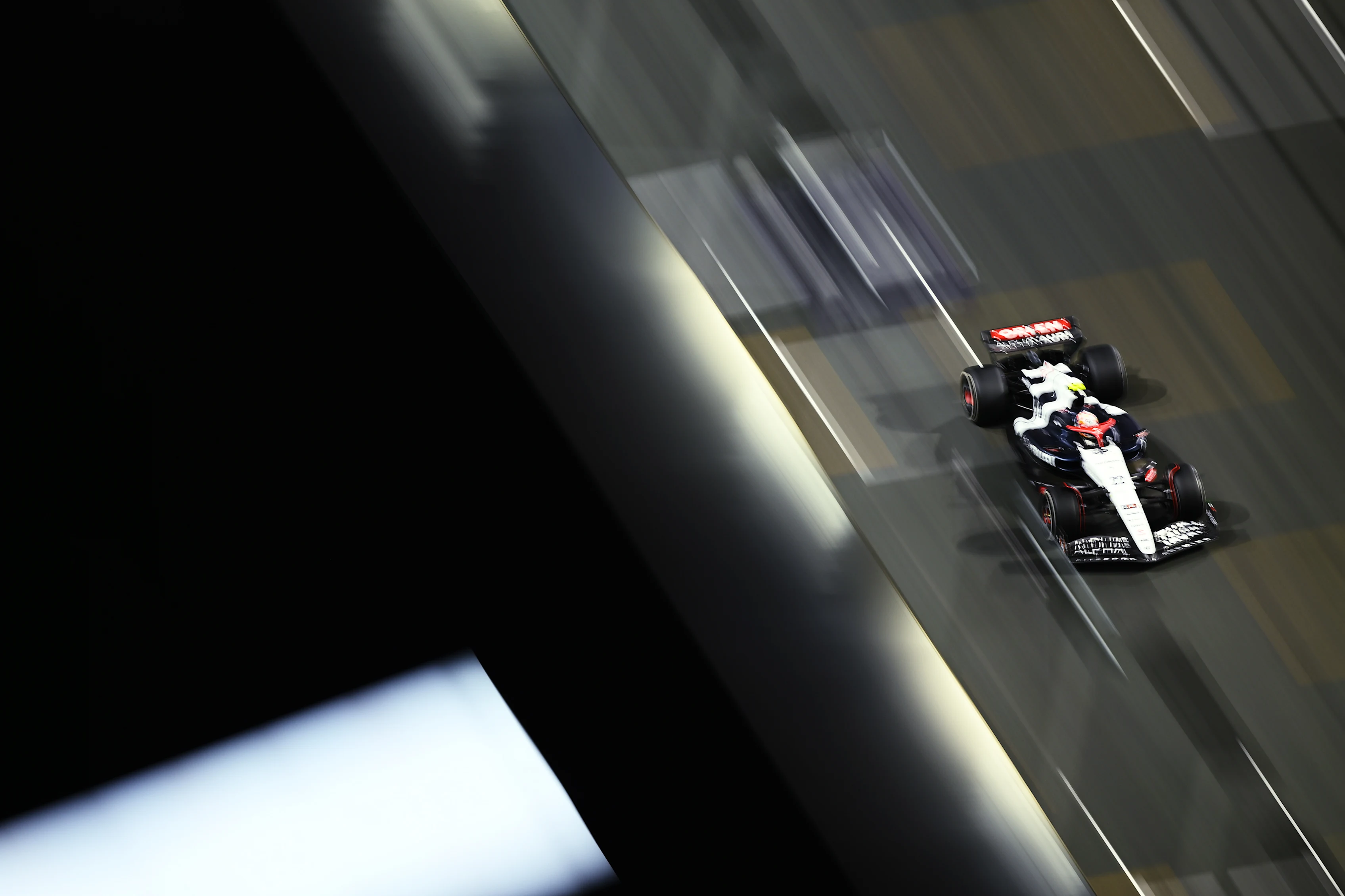 JEDDAH, SAUDI ARABIA - MARCH 19: Yuki Tsunoda of Japan driving the (22) Scuderia AlphaTauri AT04 on track during the F1 Grand Prix of Saudi Arabia at Jeddah Corniche Circuit on March 19, 2023 in Jeddah, Saudi Arabia. (Photo by Clive Mason/Getty Images)