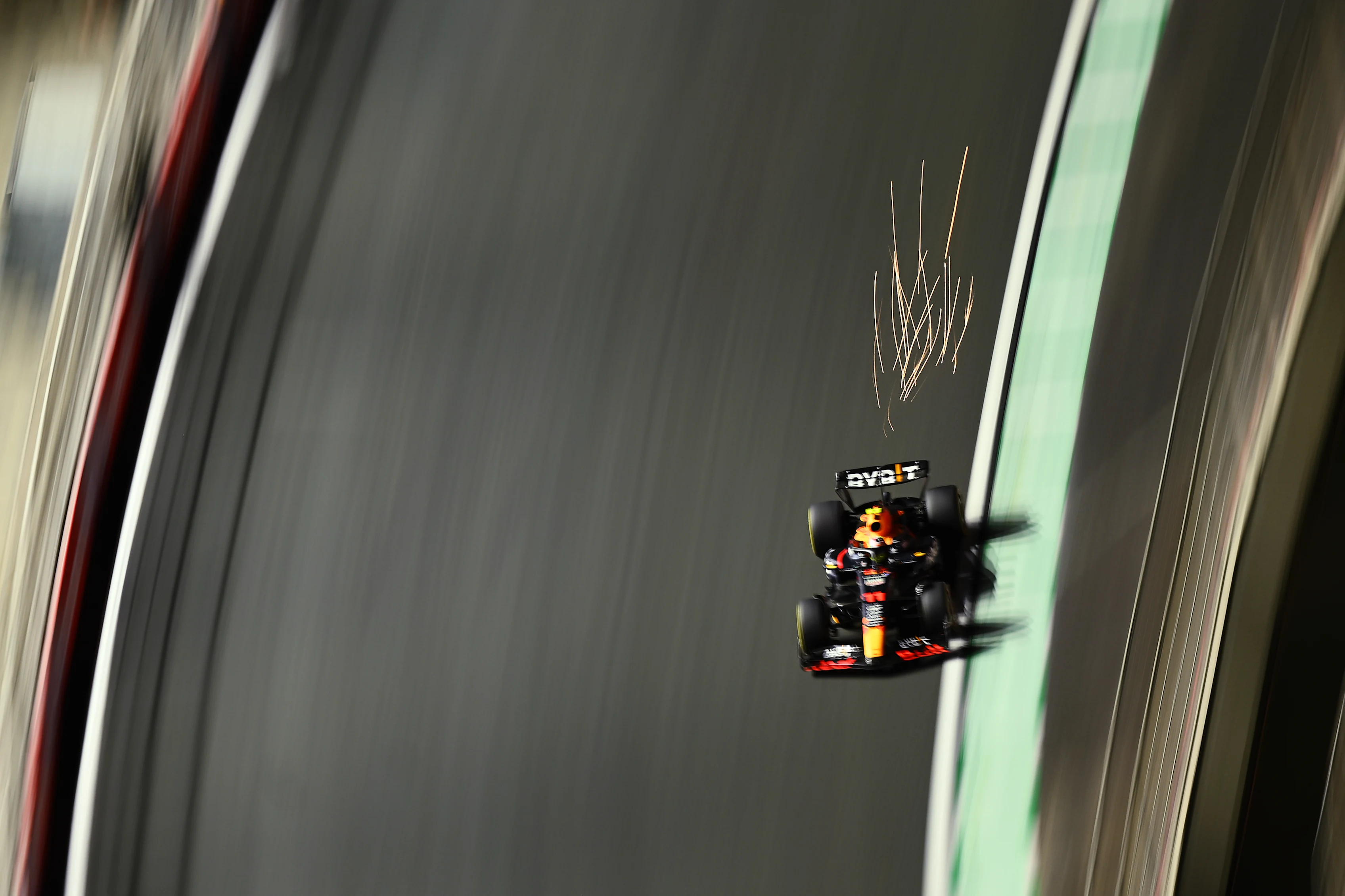 JEDDAH, SAUDI ARABIA - MARCH 19: Sparks fly behind Sergio Perez of Mexico driving the (11) Oracle