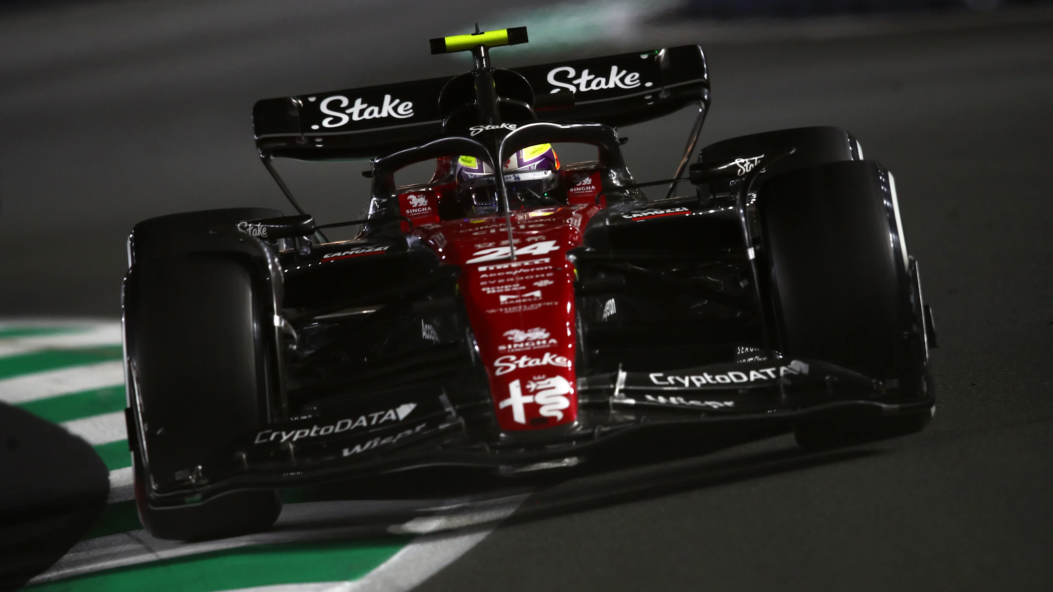 JEDDAH, SAUDI ARABIA - MARCH 19: Zhou Guanyu of China driving the (24) Alfa Romeo F1 C43 Ferrari on