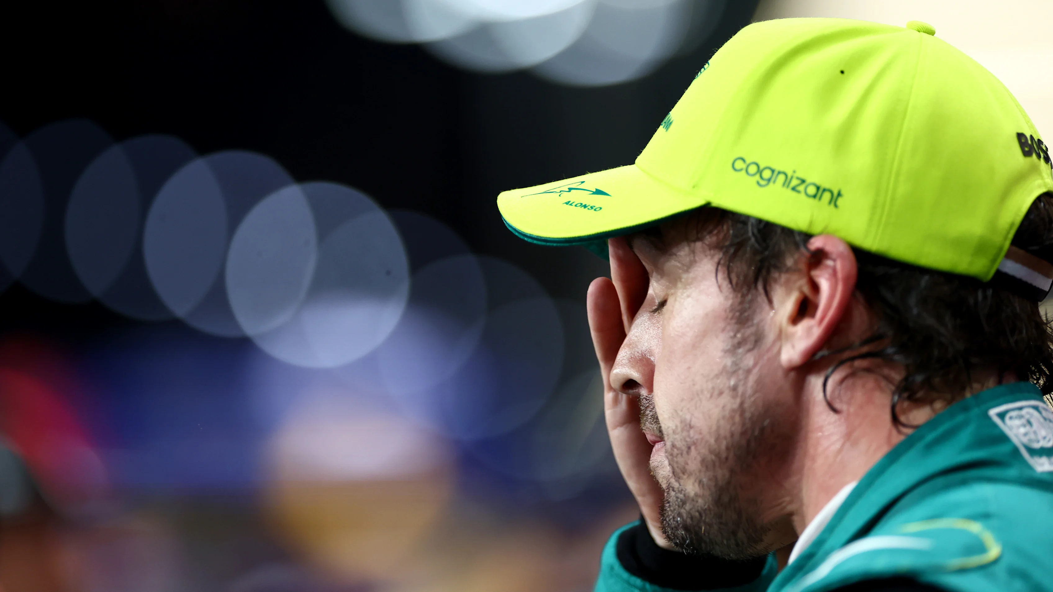 JEDDAH, SAUDI ARABIA - MARCH 18: Third placed qualifier Fernando Alonso of Spain and Aston Martin F1 Team looks on in parc ferme during qualifying ahead of the F1 Grand Prix of Saudi Arabia at Jeddah Corniche Circuit on March 18, 2023 in Jeddah, Saudi Arabia. (Photo by Dan Istitene - Formula 1/Formula 1 via Getty Images)