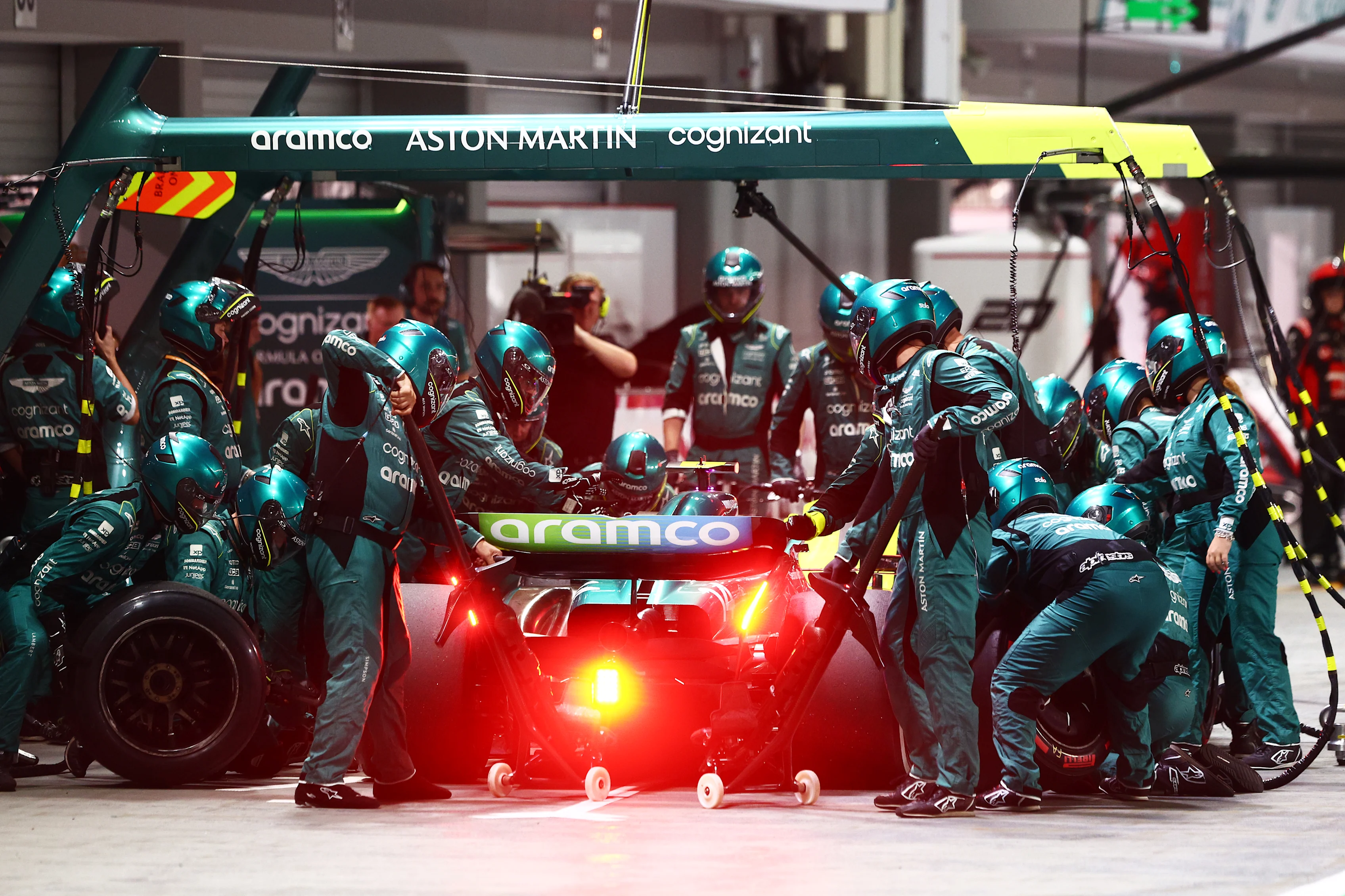 SINGAPORE, SINGAPORE - SEPTEMBER 17: Fernando Alonso of Spain driving the (14) Aston Martin AMR23