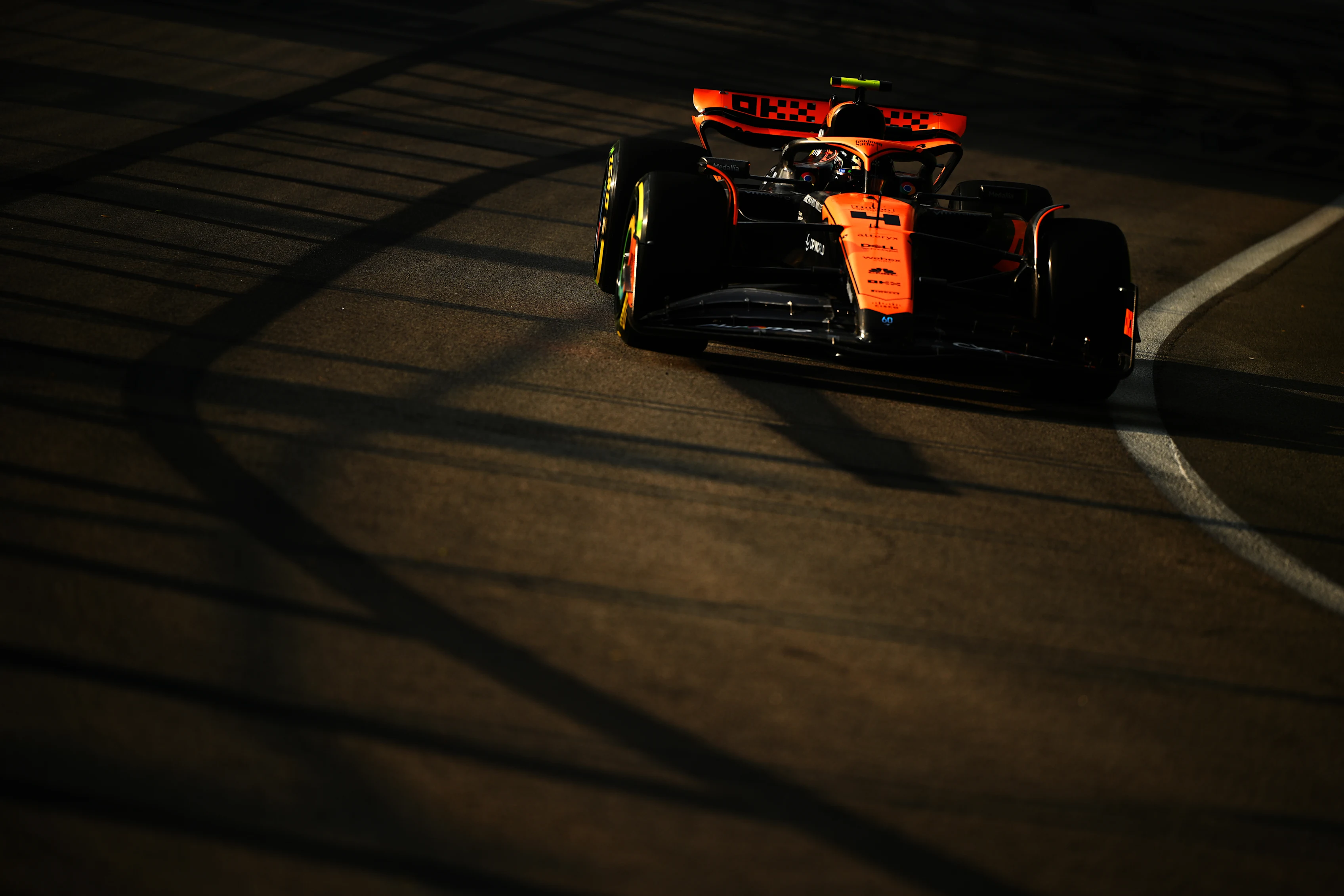 SINGAPORE, SINGAPORE - SEPTEMBER 15: Lando Norris of Great Britain driving the (4) McLaren MCL60