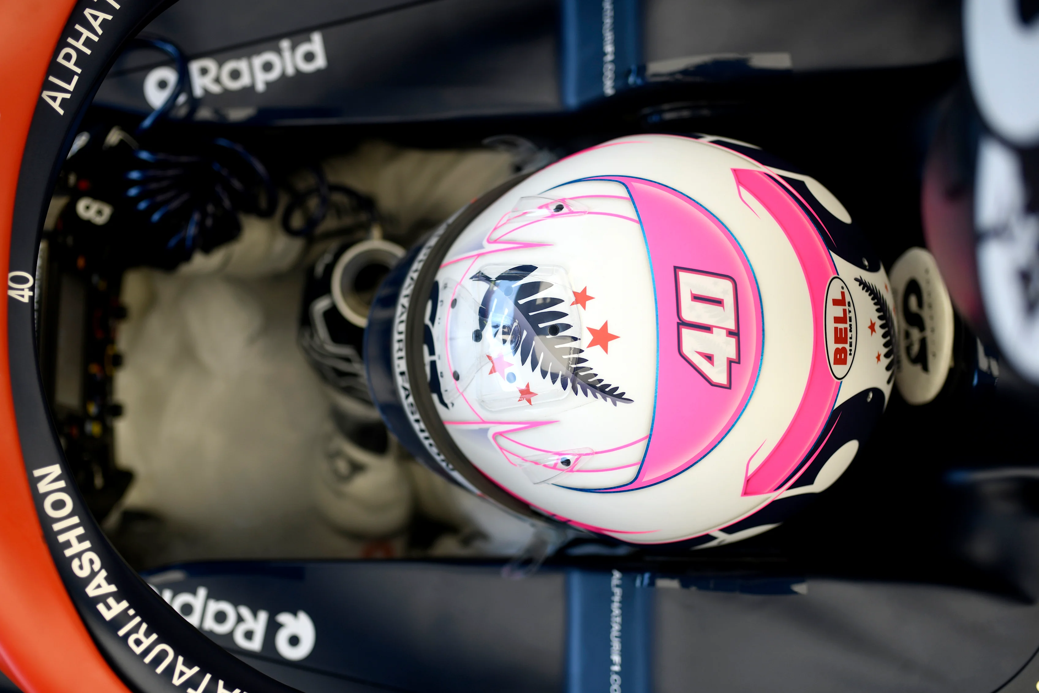 SINGAPORE, SINGAPORE - SEPTEMBER 15: Liam Lawson of New Zealand and Scuderia AlphaTauri prepares to drive in the garage during practice ahead of the F1 Grand Prix of Singapore at Marina Bay Street Circuit on September 15, 2023 in Singapore, Singapore. (Photo by Rudy Carezzevoli/Getty Images)