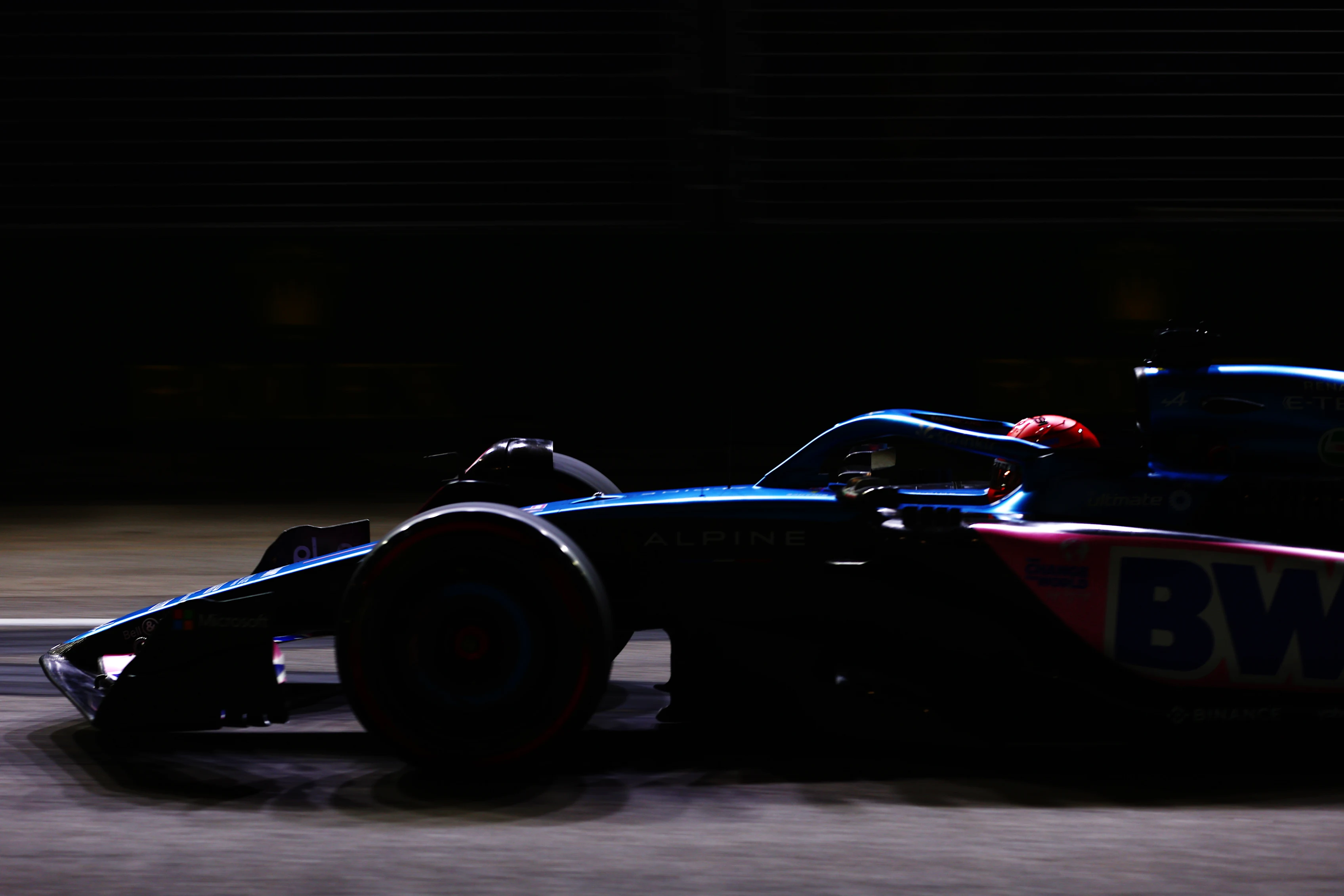 SINGAPORE, SINGAPORE - SEPTEMBER 15: Esteban Ocon of France driving the (31) Alpine F1 A523 Renault
