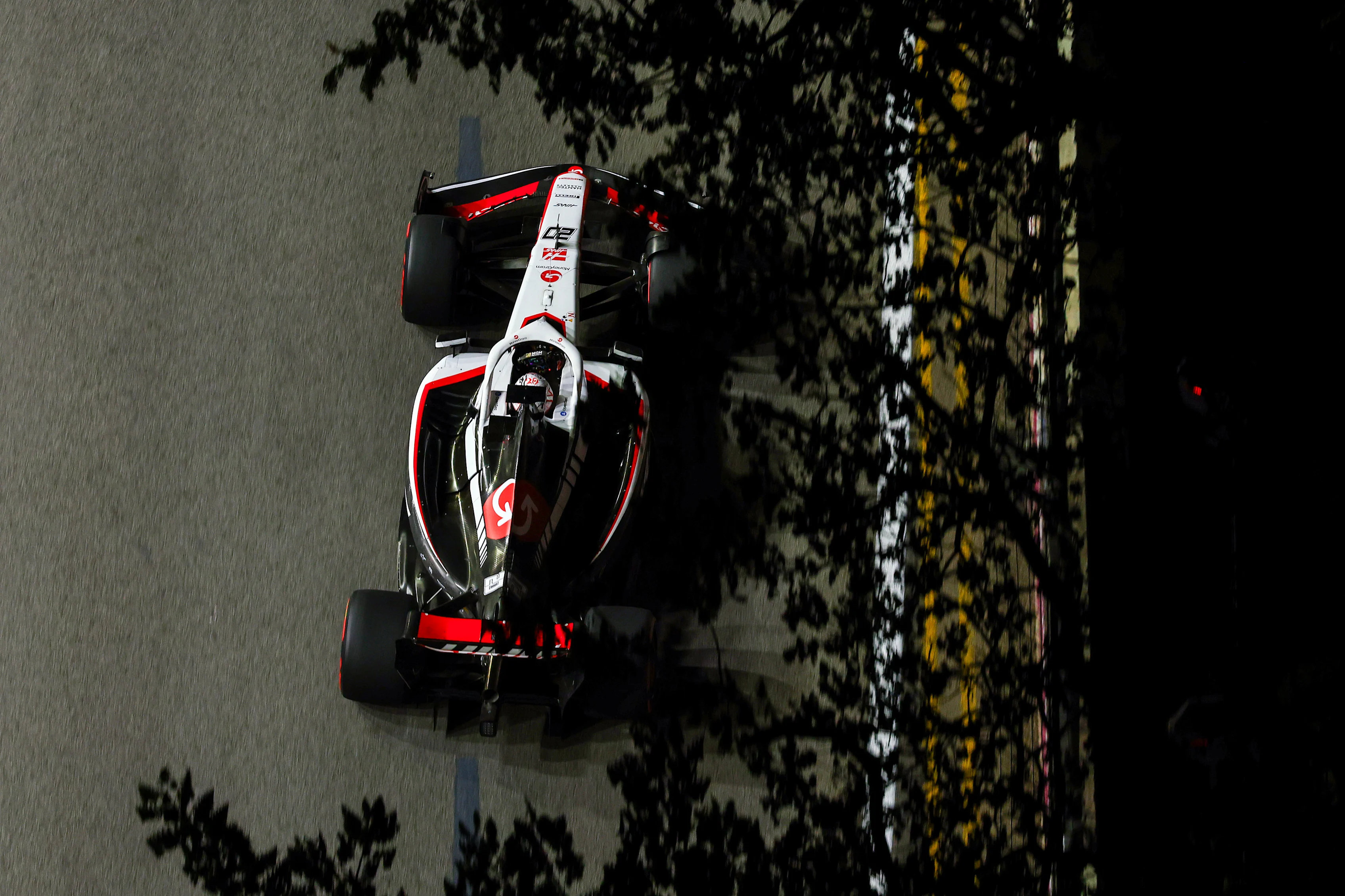 SINGAPORE, SINGAPORE - SEPTEMBER 15: Kevin Magnussen of Denmark driving the (20) Haas F1 VF-23 Ferrari on track during practice ahead of the F1 Grand Prix of Singapore at Marina Bay Street Circuit on September 15, 2023 in Singapore, Singapore. (Photo by Mark Thompson/Getty Images)