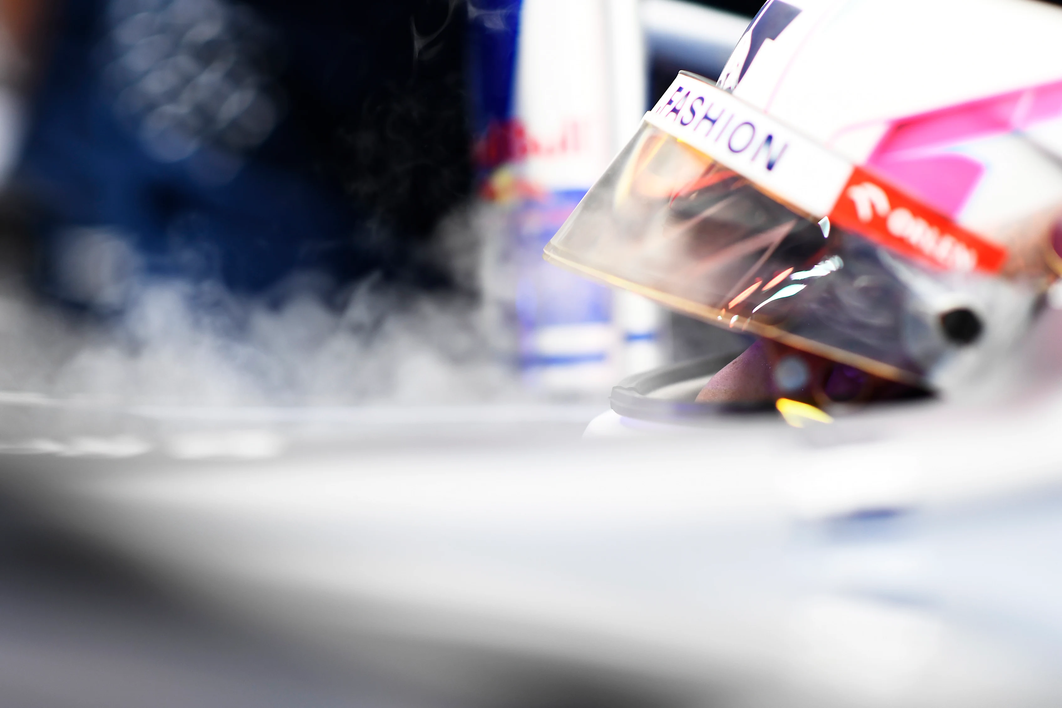 SINGAPORE, SINGAPORE - SEPTEMBER 16: Liam Lawson of New Zealand and Scuderia AlphaTauri prepares to drive in the garage during qualifying ahead of the F1 Grand Prix of Singapore at Marina Bay Street Circuit on September 16, 2023 in Singapore, Singapore. (Photo by Rudy Carezzevoli/Getty Images)