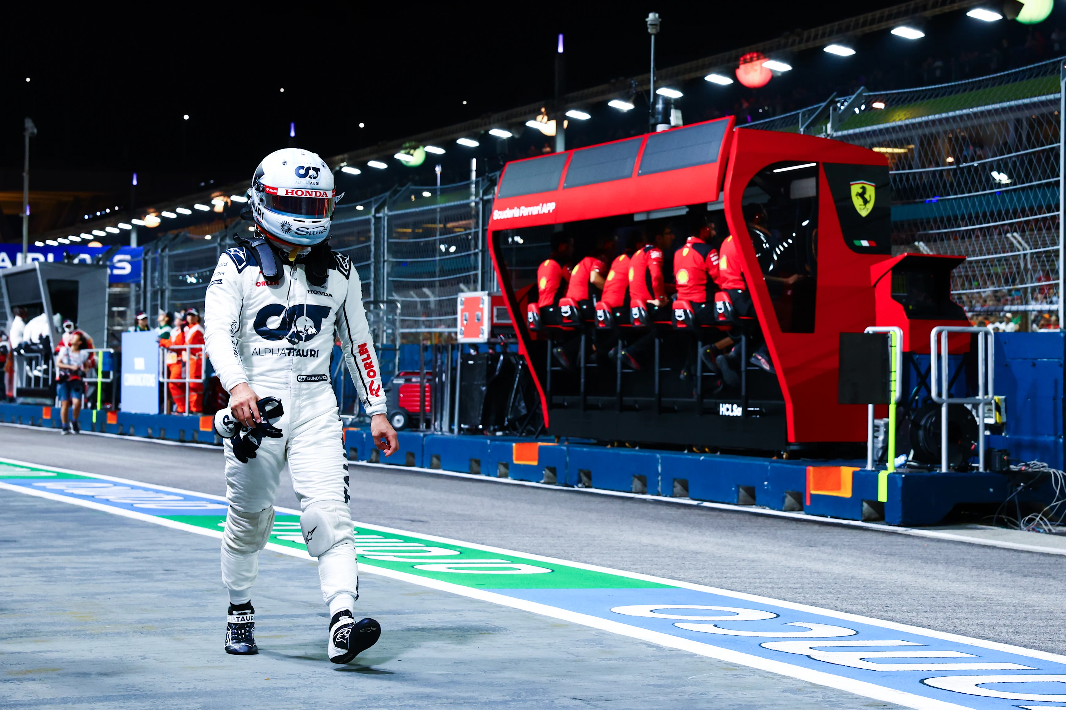 SINGAPORE, SINGAPORE - SEPTEMBER 16: 15th placed qualifier Yuki Tsunoda of Japan and Scuderia