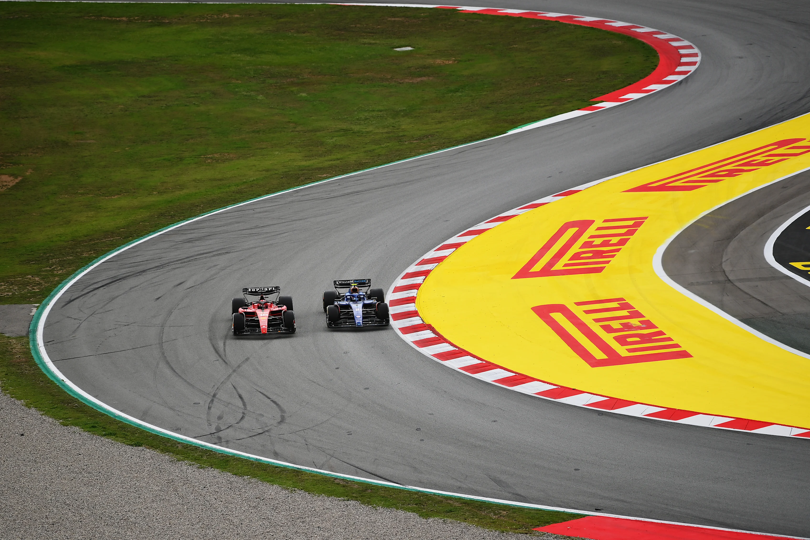 BARCELONA, SPAIN - JUNE 04: Charles Leclerc of Monaco driving the (16) Ferrari SF-23 leads Logan Sargeant of United States driving the (2) Williams FW45 Mercedes on track during the F1 Grand Prix of Spain at Circuit de Barcelona-Catalunya on June 04, 2023 in Barcelona, Spain. (Photo by Dan Mullan - Formula 1/Formula 1 via Getty Images)