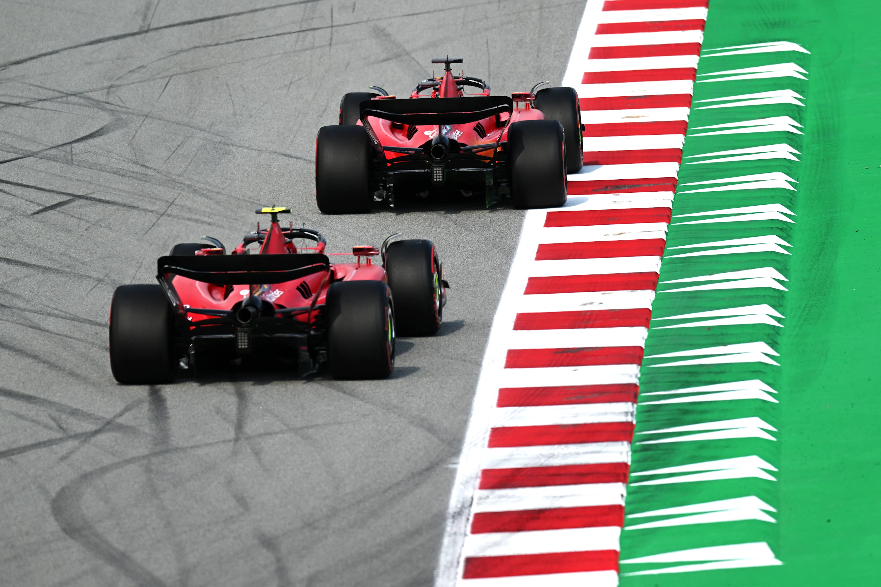 BARCELONA, SPAIN - JUNE 02: Charles Leclerc of Monaco driving the (16) Ferrari SF-23 leads Carlos Sainz of Spain driving (55) the Ferrari SF-23 on track during practice ahead of the F1 Grand Prix of Spain at Circuit de Barcelona-Catalunya on June 02, 2023 in Barcelona, Spain. (Photo by David Ramos/Getty Images)