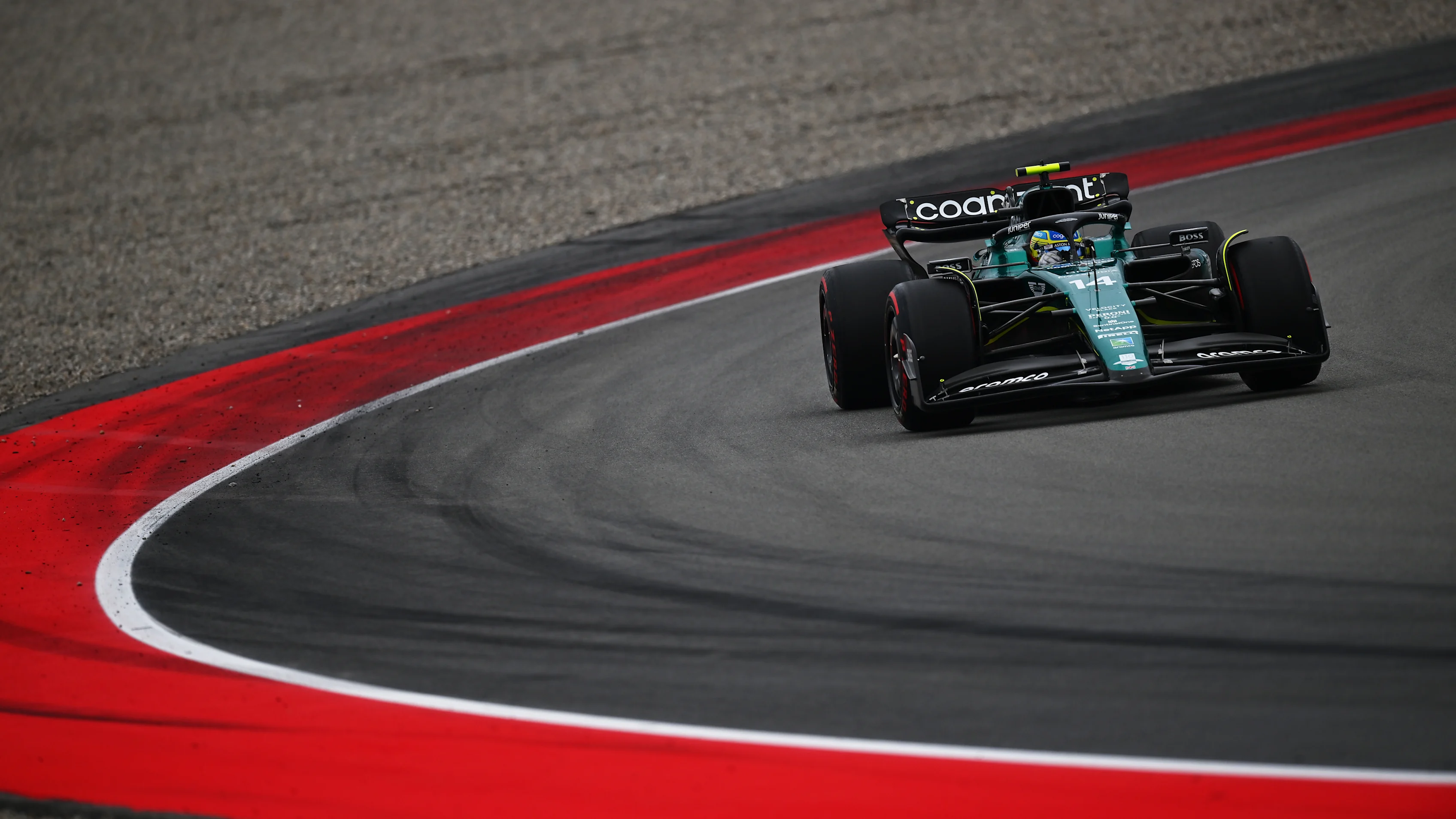 BARCELONA, SPAIN - JUNE 03: Fernando Alonso of Spain driving the (14) Aston Martin AMR23 Mercedes on track during qualifying ahead of the F1 Grand Prix of Spain at Circuit de Barcelona-Catalunya on June 03, 2023 in Barcelona, Spain. (Photo by Dan Mullan - Formula 1/Formula 1 via Getty Images)