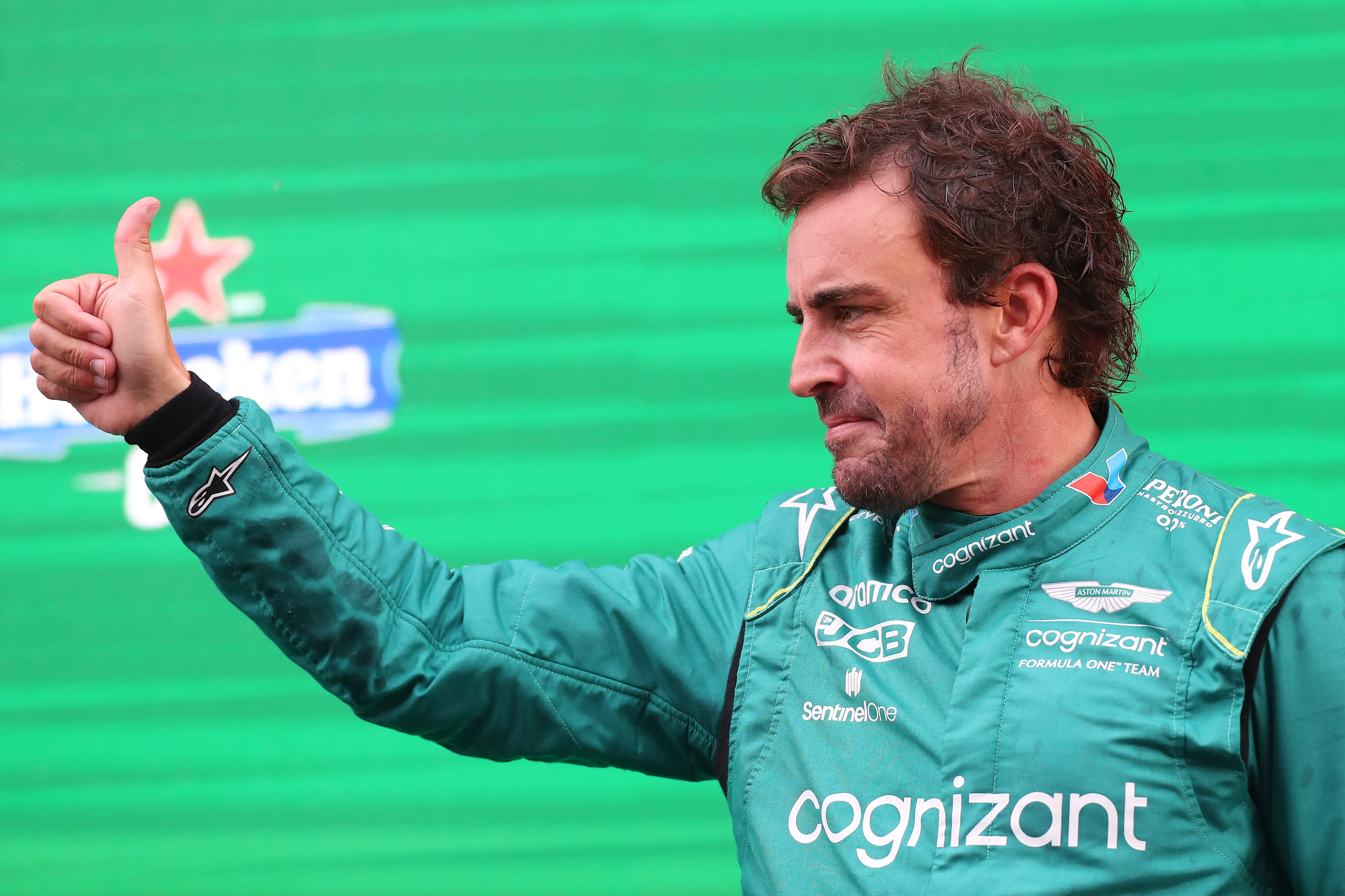 ZANDVOORT, NETHERLANDS - AUGUST 27: Second placed Fernando Alonso of Spain and Aston Martin F1 Team