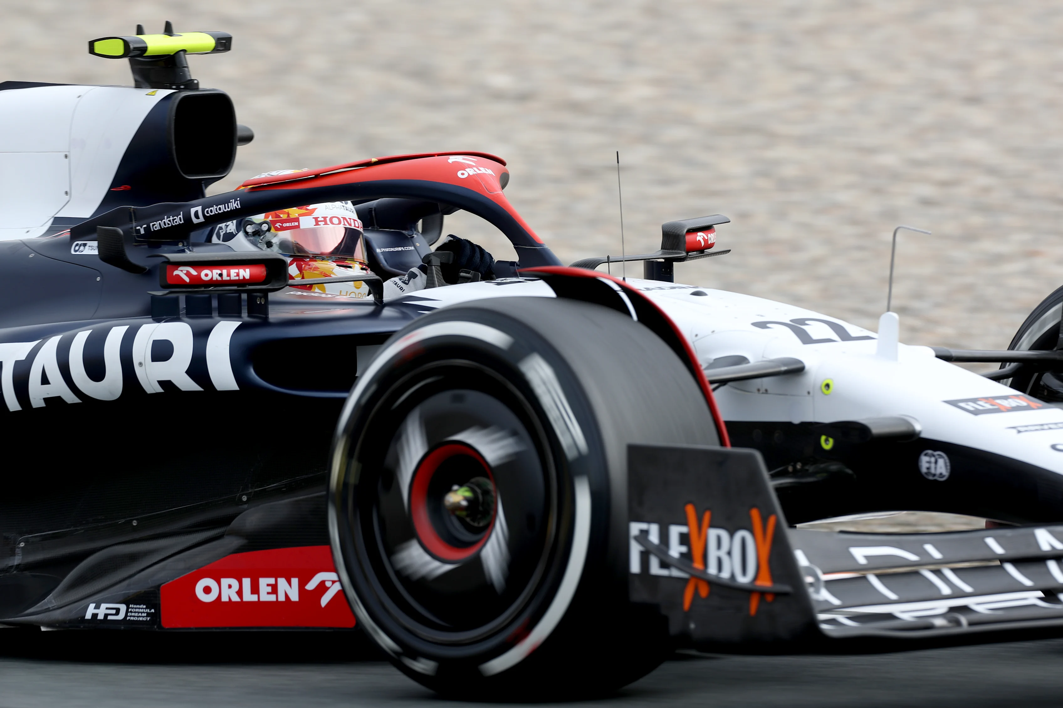 ZANDVOORT, NETHERLANDS - AUGUST 25: Yuki Tsunoda of Japan driving the (22) Scuderia AlphaTauri AT04 on track during practice ahead of the F1 Grand Prix of The Netherlands at Circuit Zandvoort on August 25, 2023 in Zandvoort, Netherlands. (Photo by Peter Fox/Getty Images)