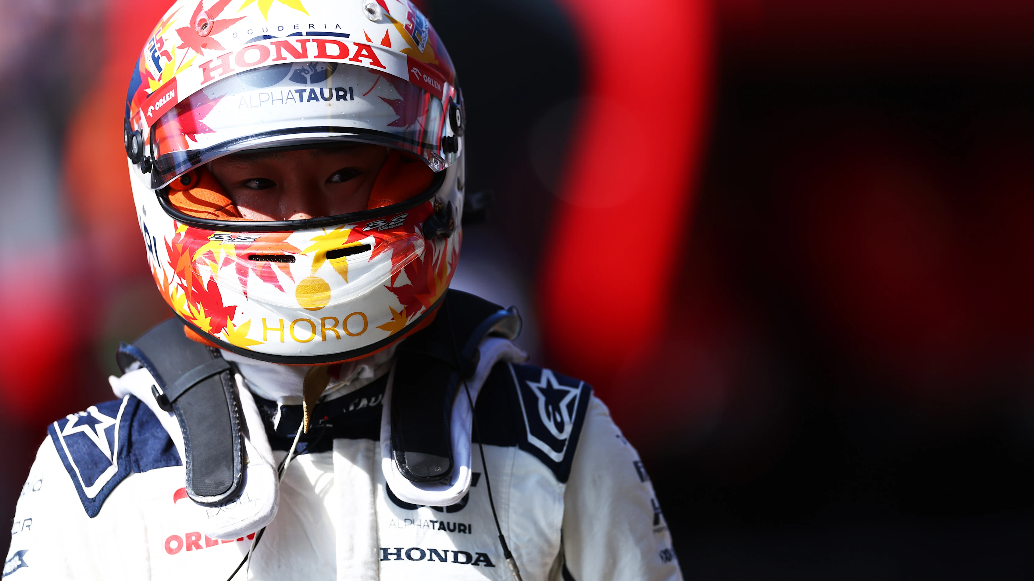 ZANDVOORT, NETHERLANDS - AUGUST 26: 14th placed qualifier Yuki Tsunoda of Japan and Scuderia AlphaTauri walks in the Pitlane during qualifying ahead of the F1 Grand Prix of The Netherlands at Circuit Zandvoort on August 26, 2023 in Zandvoort, Netherlands. (Photo by Dan Istitene - Formula 1/Formula 1 via Getty Images)