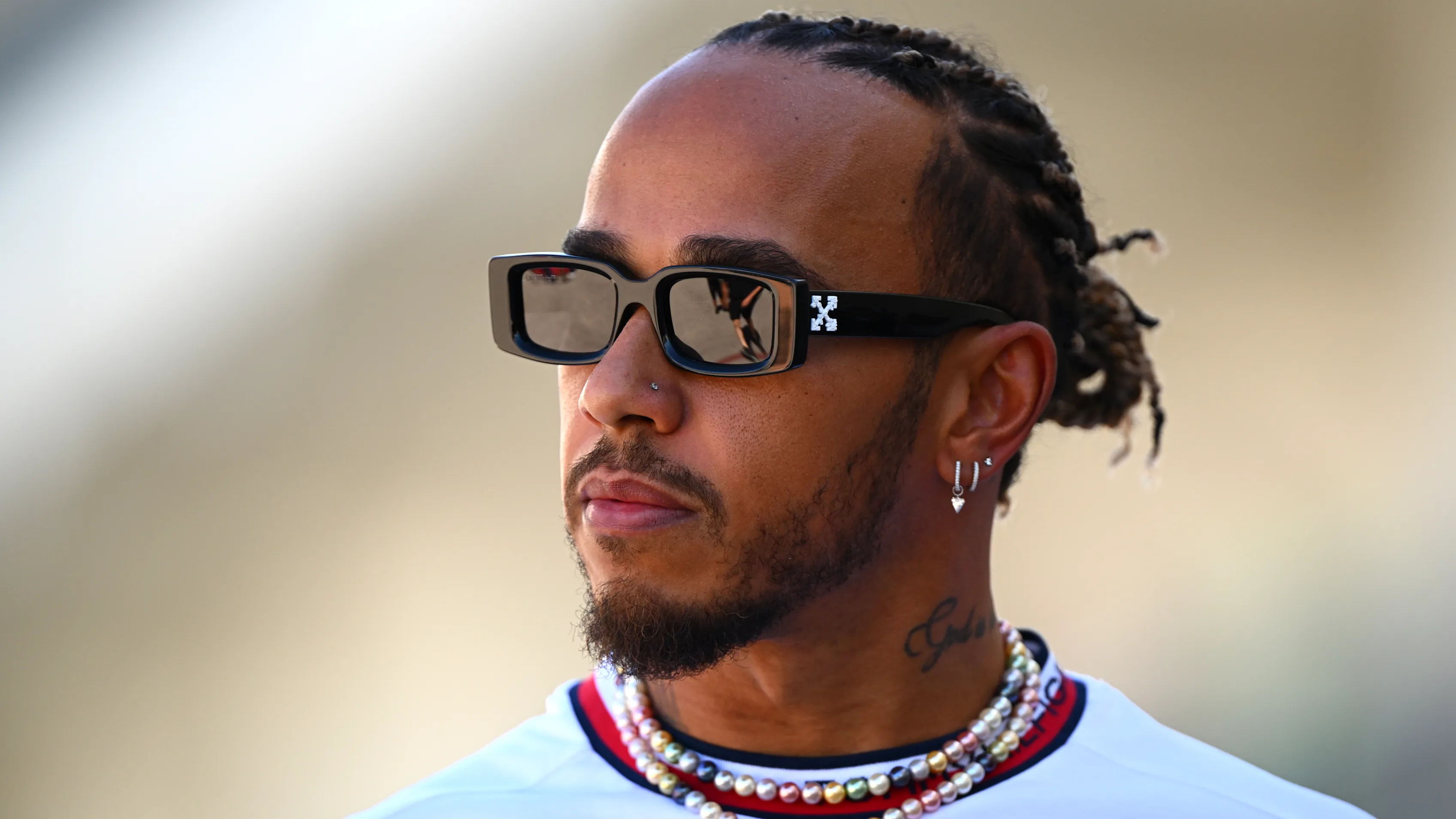 AUSTIN, TEXAS - OCTOBER 19: Lewis Hamilton of Great Britain and Mercedes walks in the Paddock