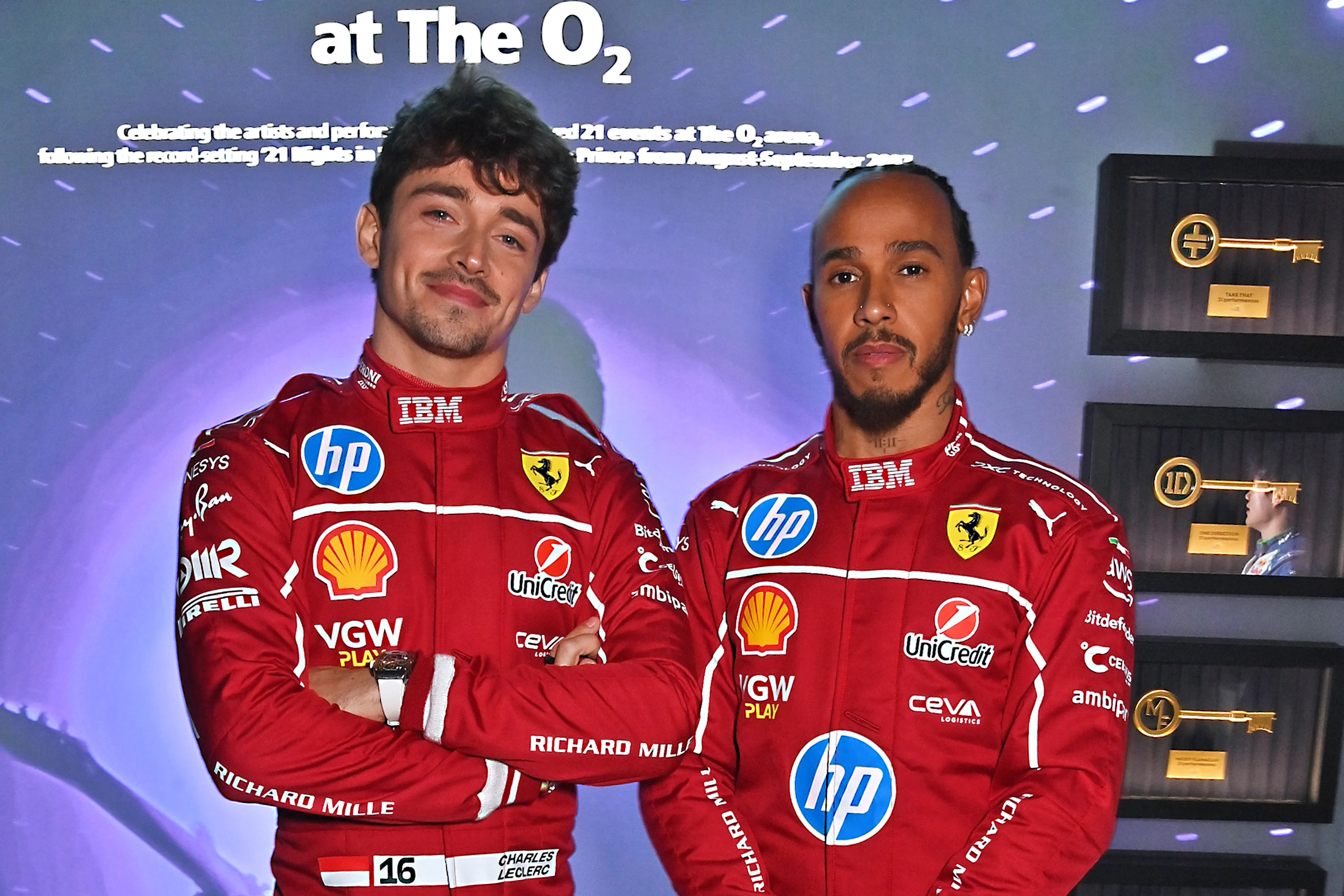 LONDON, ENGLAND - FEBRUARY 18: Charles Leclerc of Monaco and Scuderia Ferrari and Lewis Hamilton of